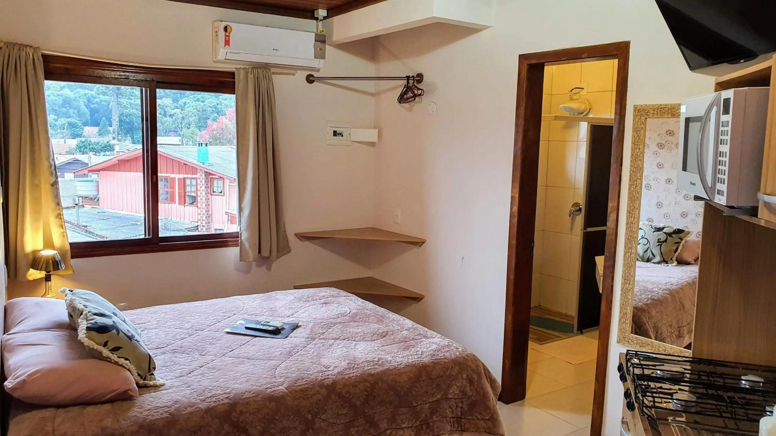 Toilet, Bed in Residencial Borges Canela