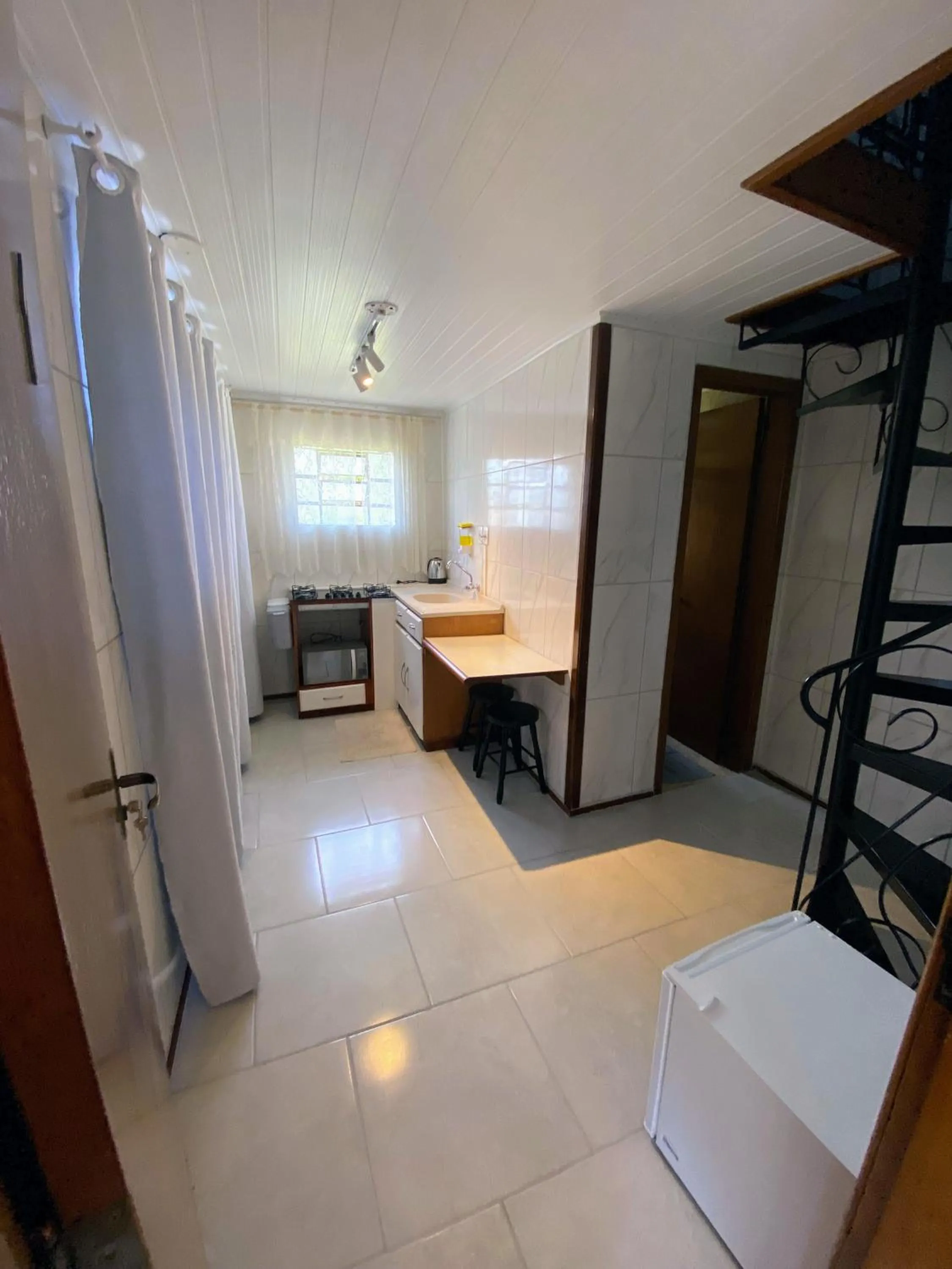 Kitchen or kitchenette, Bed in Residencial Borges Canela