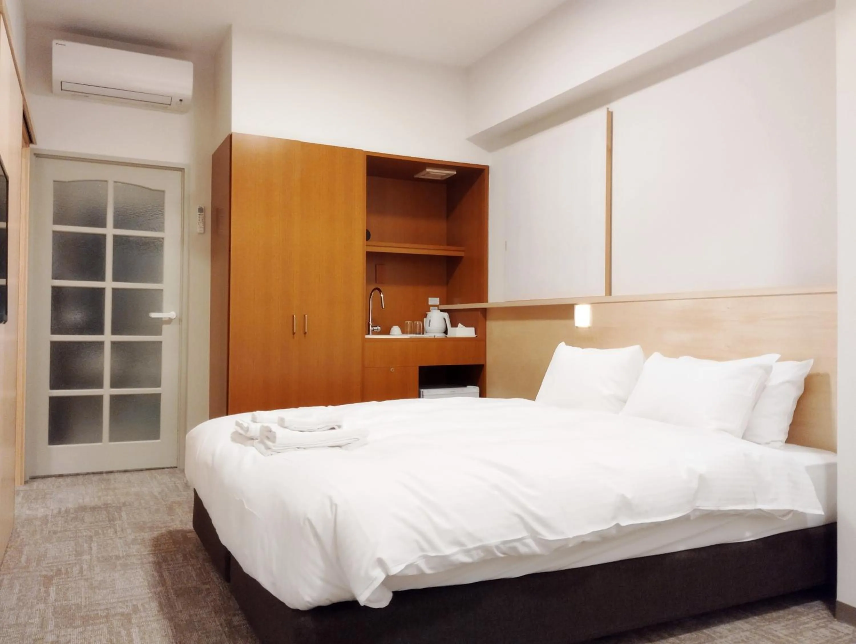 Bed in Apartment Hotel DIG the OSAKA