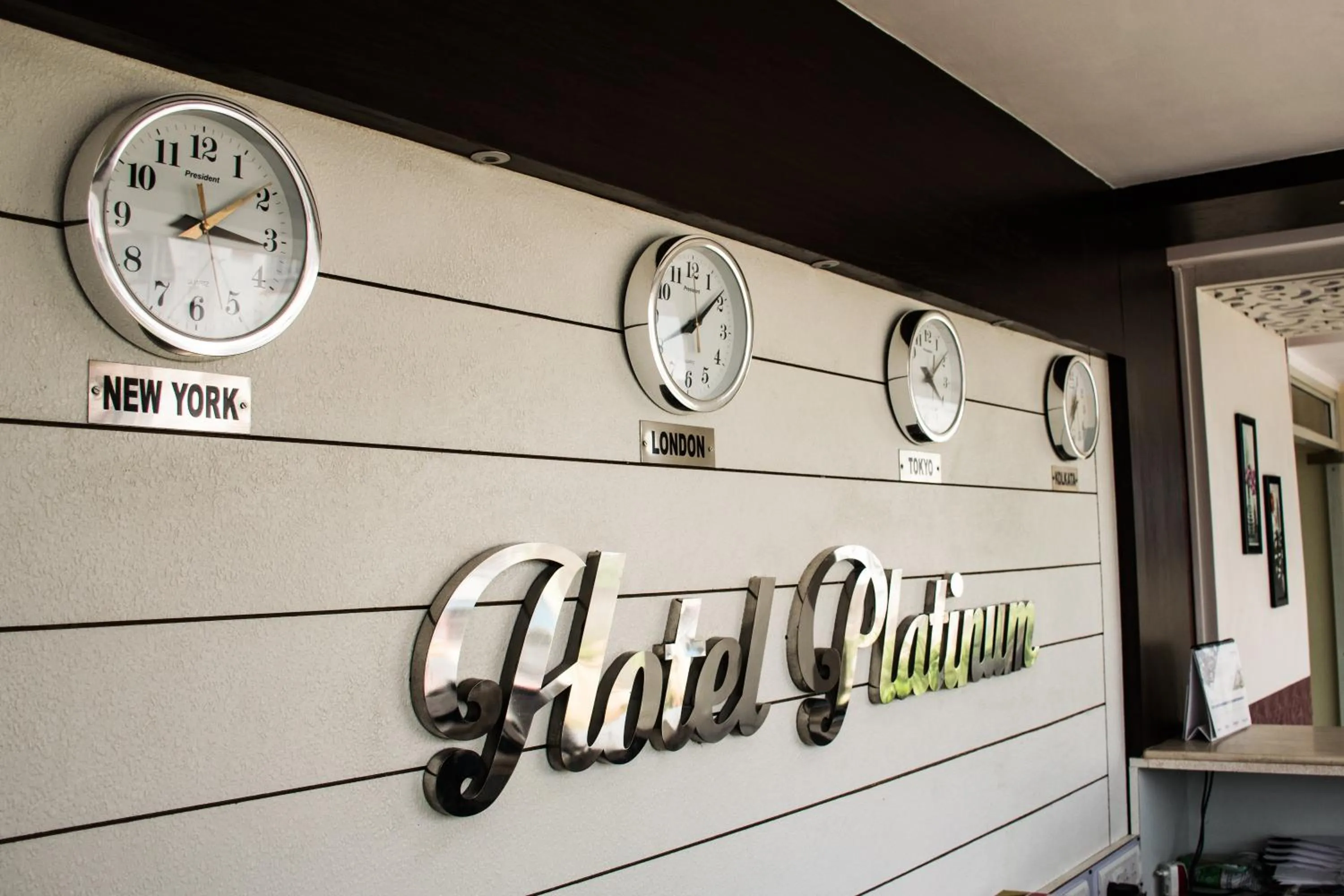 Property logo or sign in Hotel Platinum