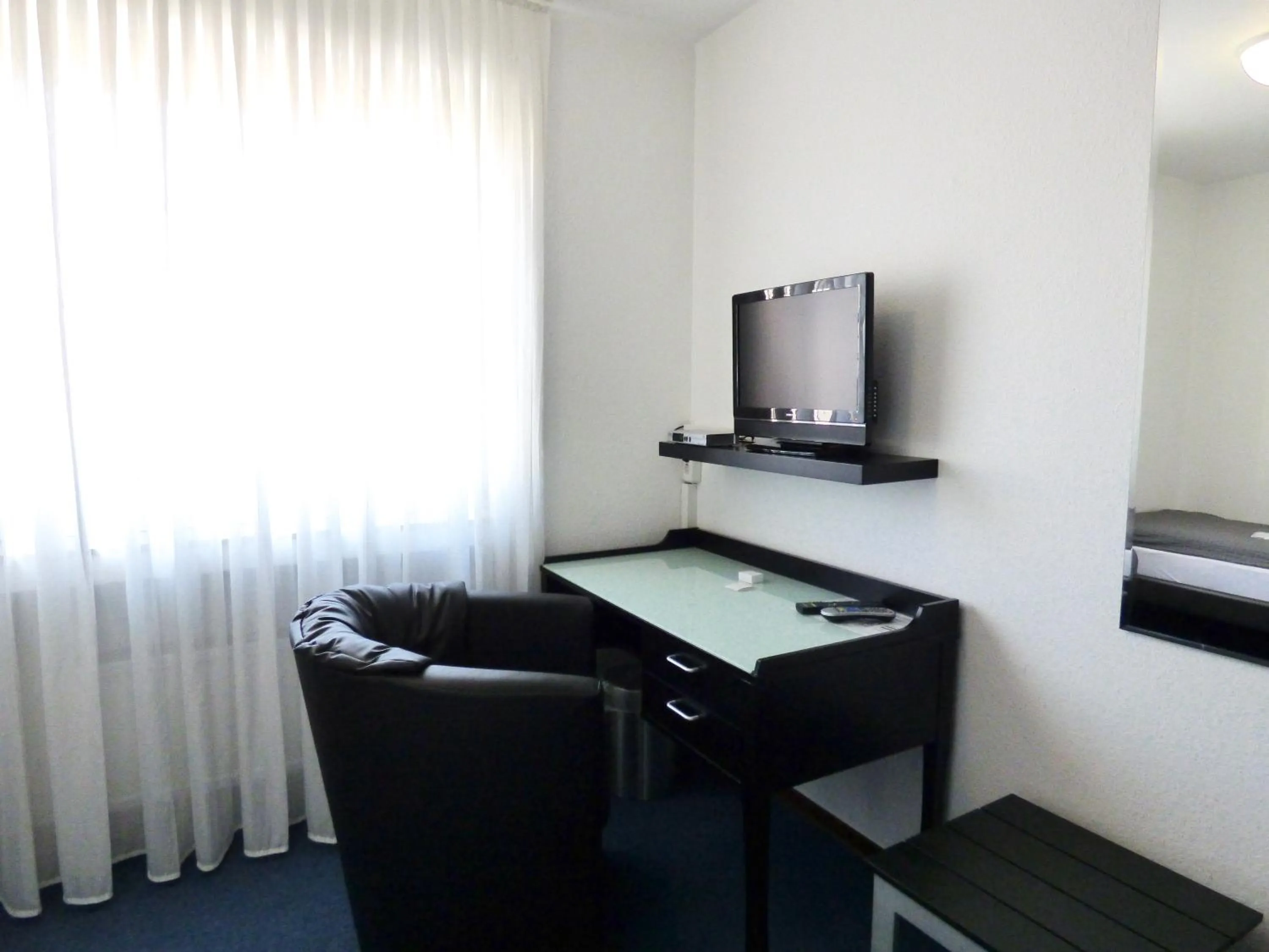 Photo of the whole room in Hotel Alt Büttgen