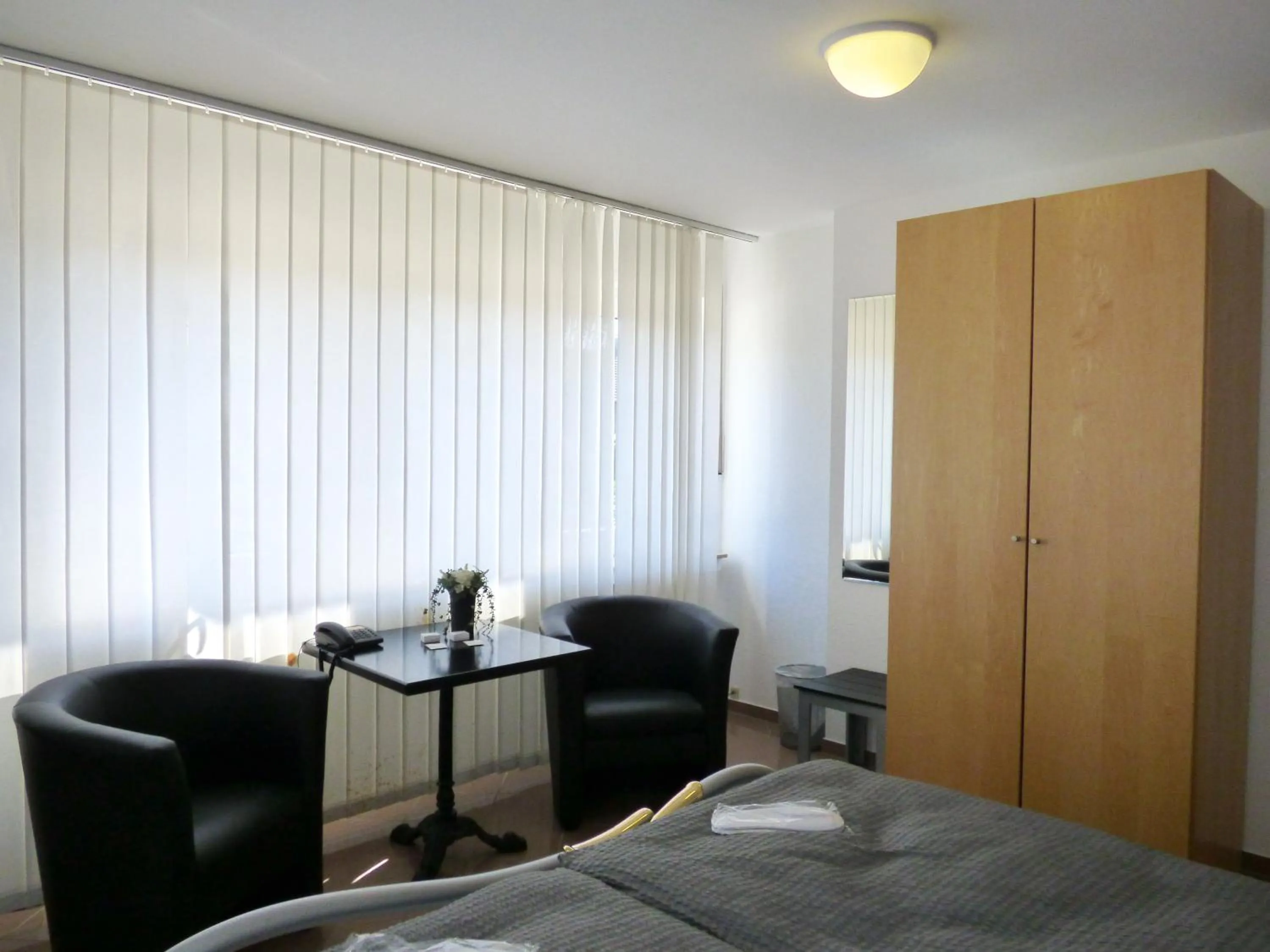 Photo of the whole room, Bed in Hotel Alt Büttgen