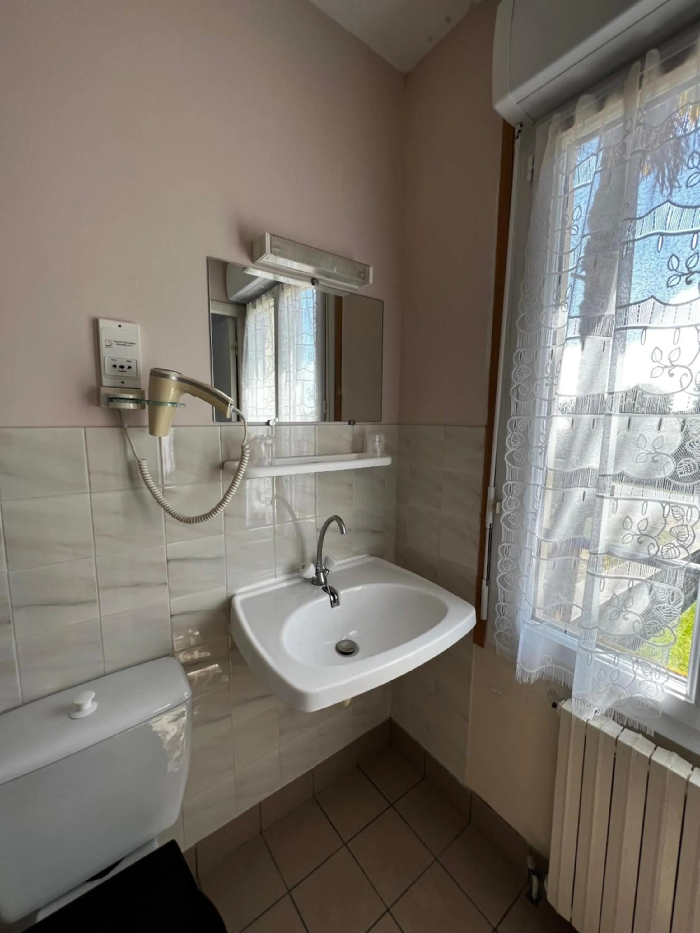 Bathroom in Contact Hotel Les Montois