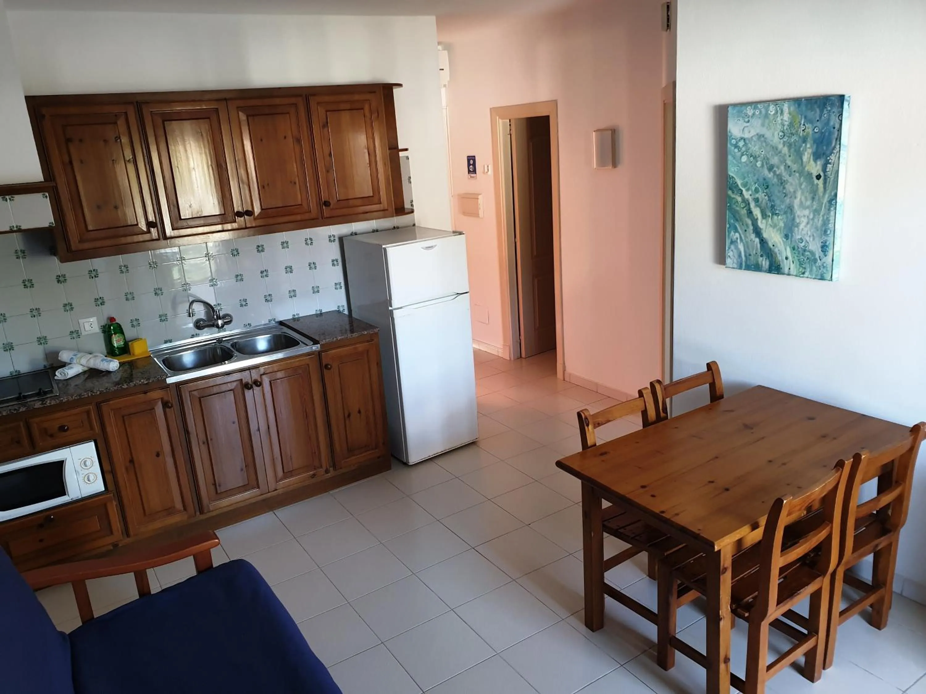 Kitchen or kitchenette in Apartamentos Piscis