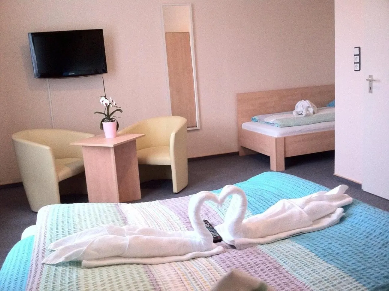 Photo of the whole room, Bed in Hotel Norden Norddeich