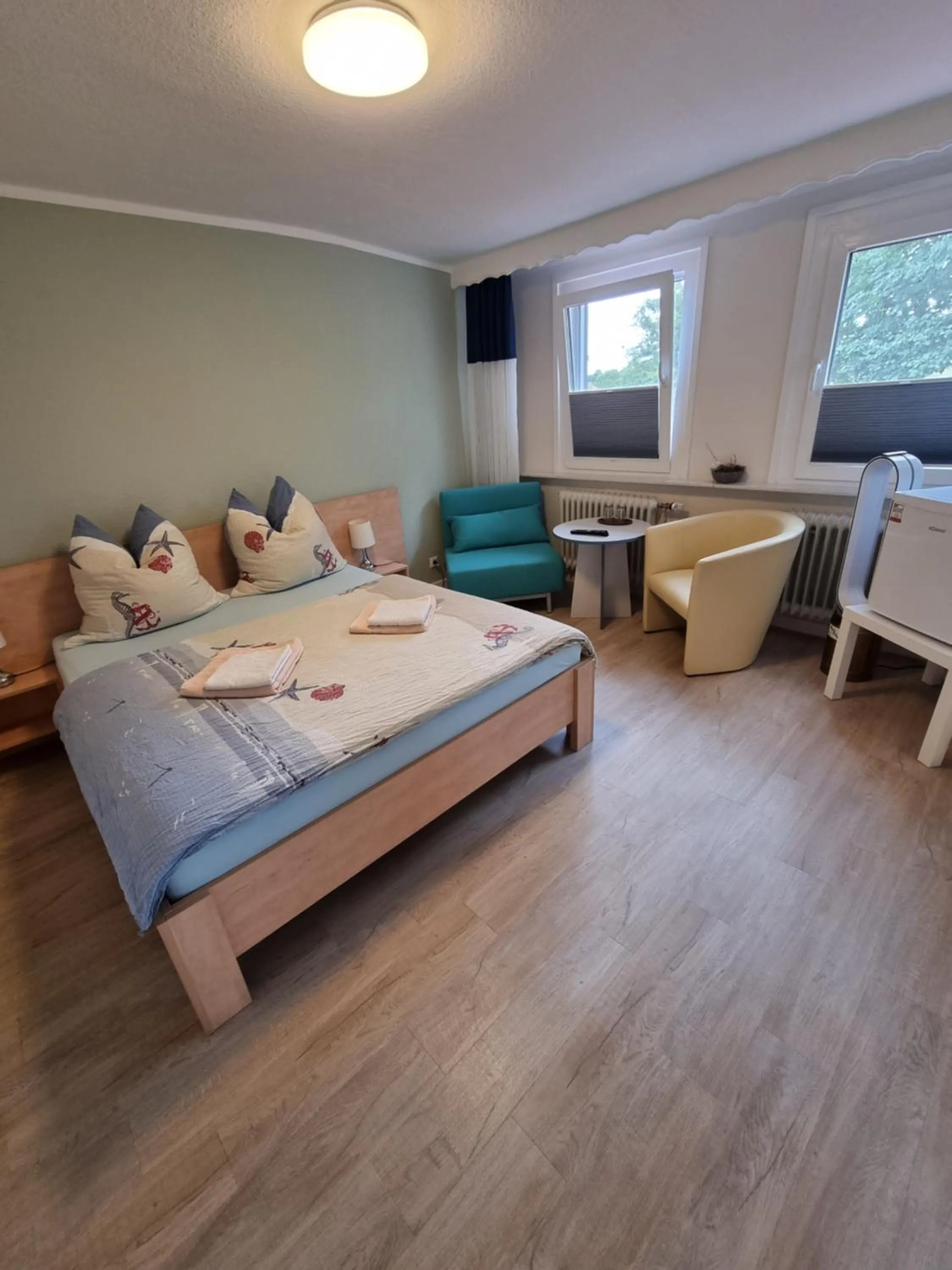 Photo of the whole room, Bed in Hotel Norden Norddeich