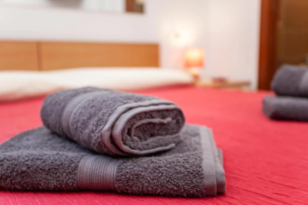 towels, Bed in Mivida "Le stanze di Ada"
