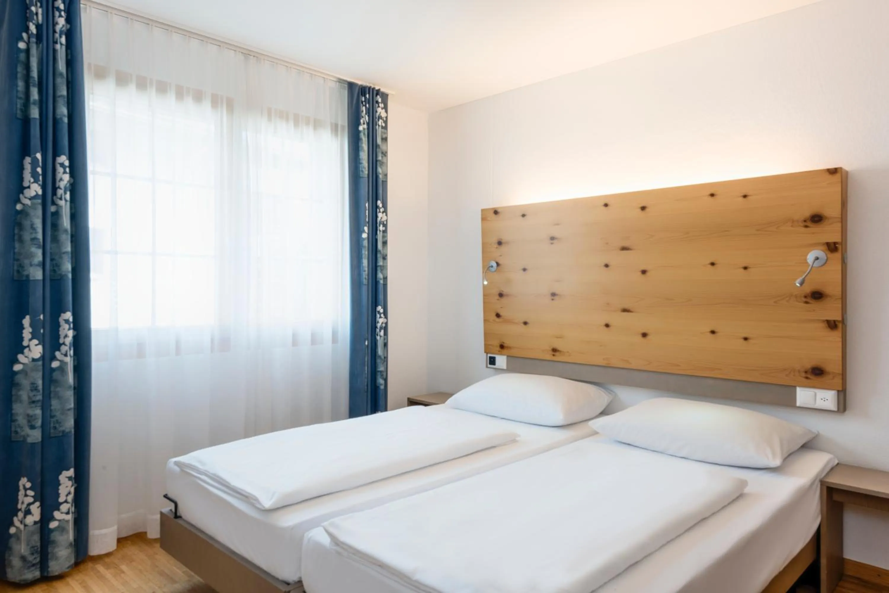 Bed in Hapimag Ferienwohnungen Flims