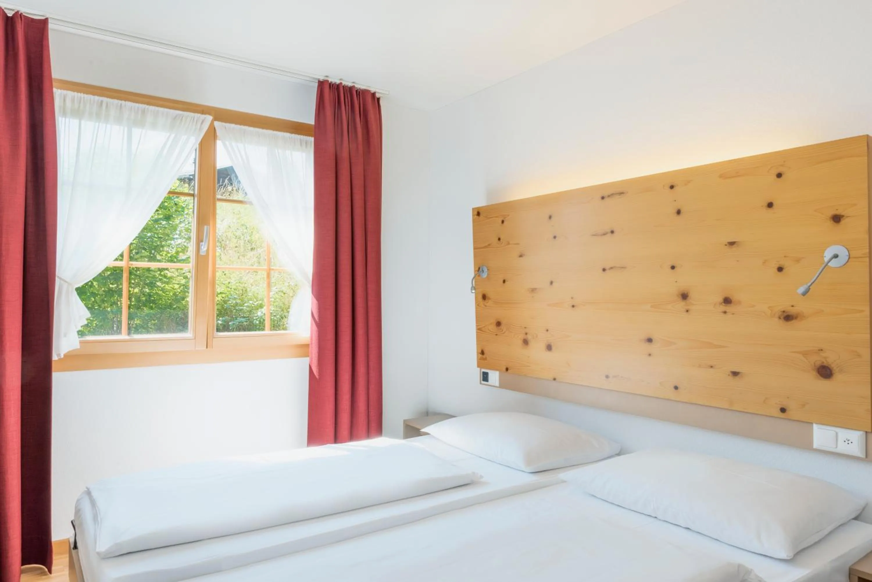 Bed in Hapimag Ferienwohnungen Flims