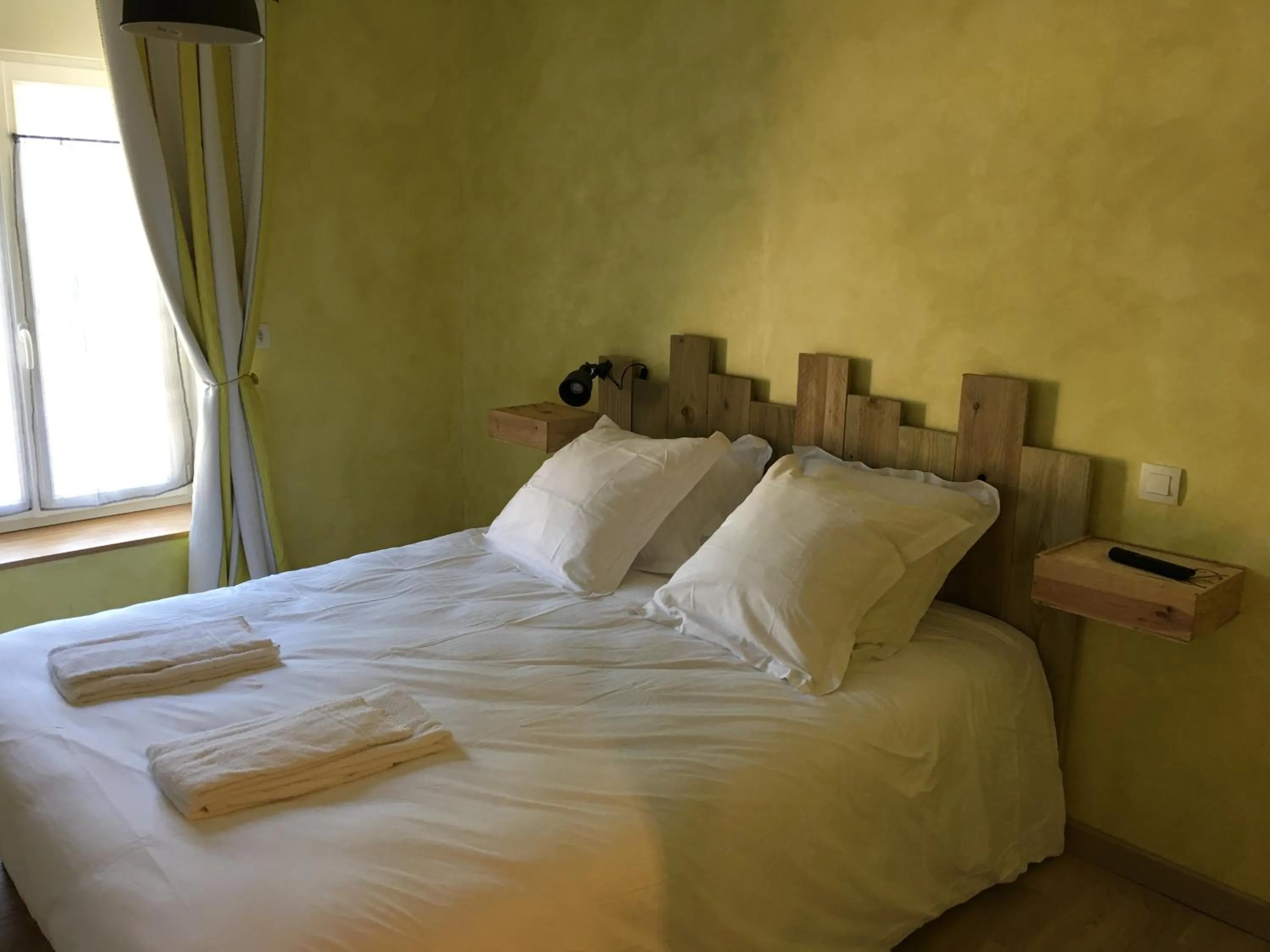 Bed in Les chambres de La Métairie du Dick