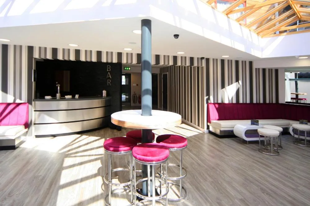 Lounge or bar in Damon’s Hotel