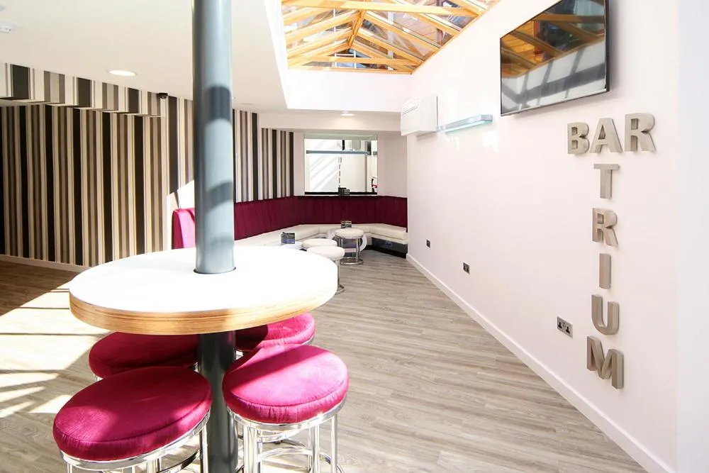 Lounge or bar in Damon’s Hotel