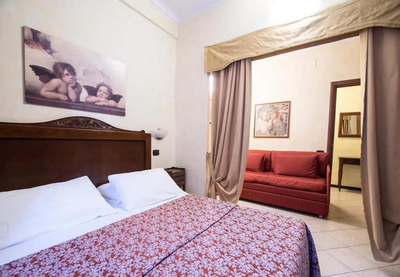 Family triple room in Limone Palace Aparthotel Family triple room in Limone Palace Aparthotel