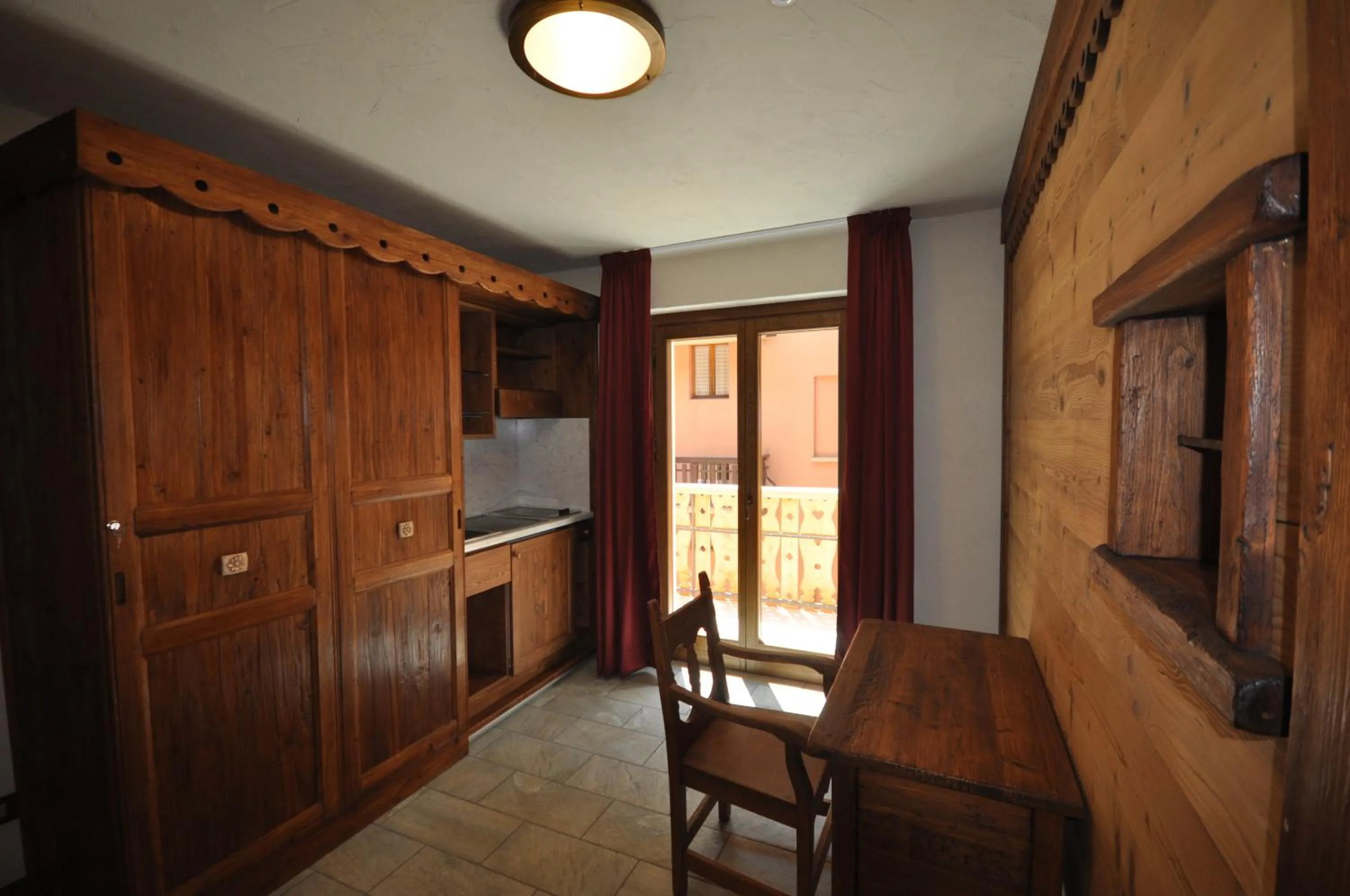 Kitchen or kitchenette in Limone Palace Aparthotel