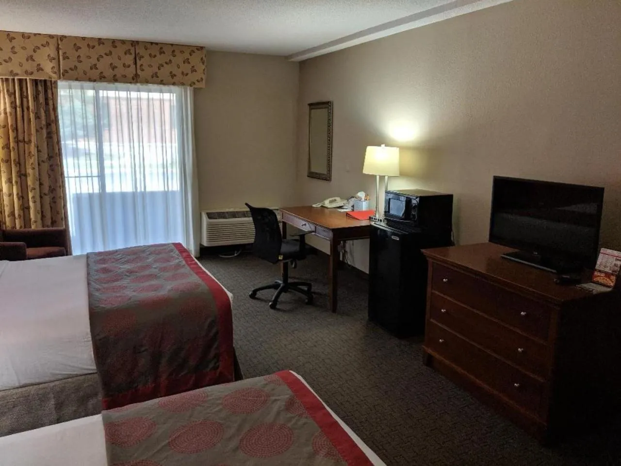 Bedroom, Bed in Ramada by Wyndham Raleigh