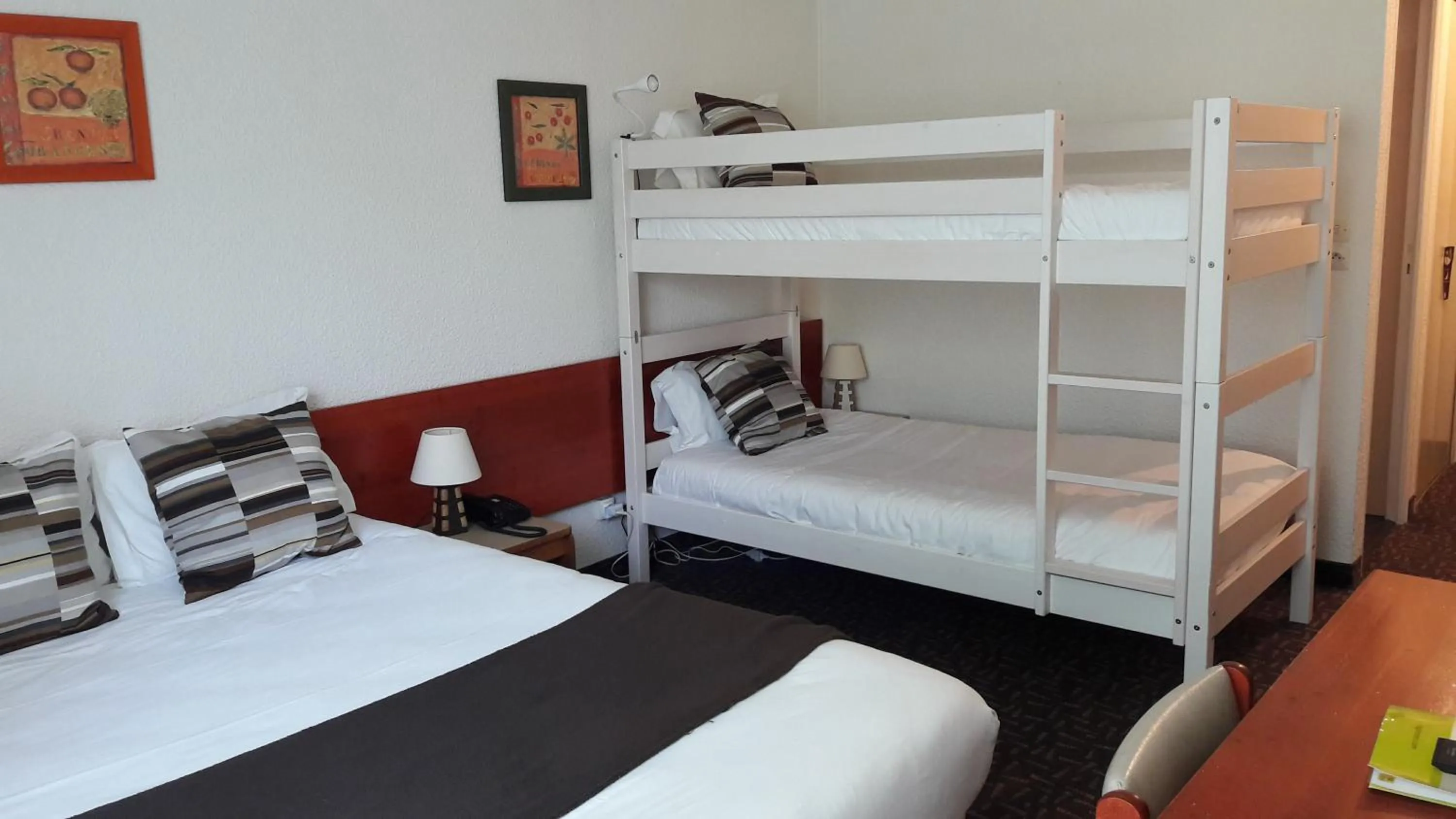 Bedroom, Bed in Hôtel-Restaurant La Belle Poule - Contact Hotel