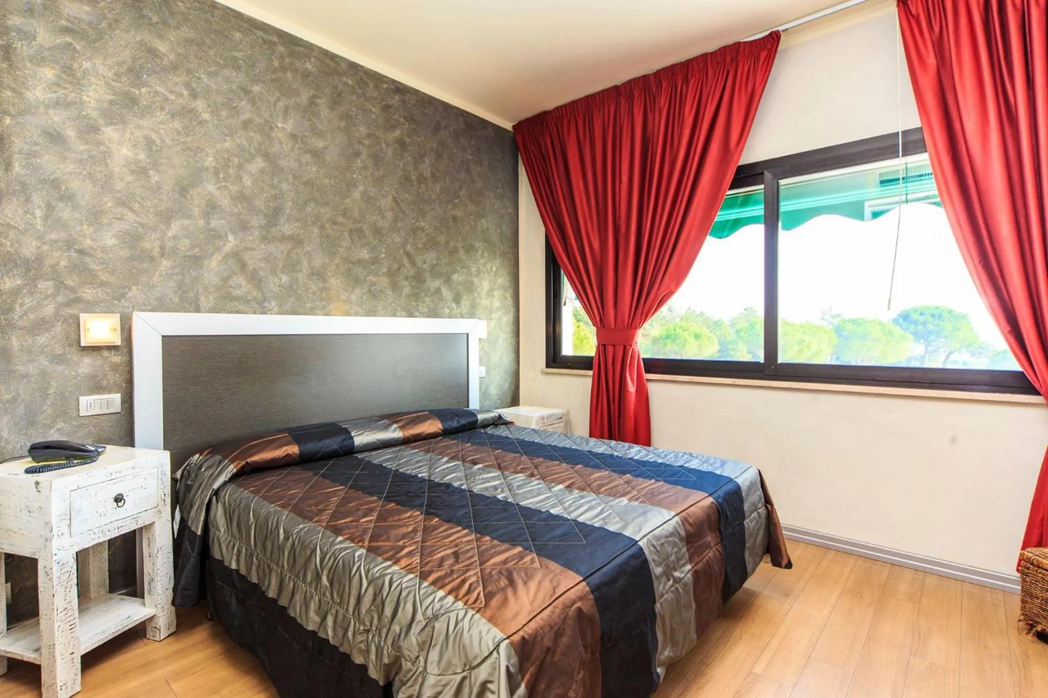 Photo of the whole room, Bed in Villaggio La Pescaccia