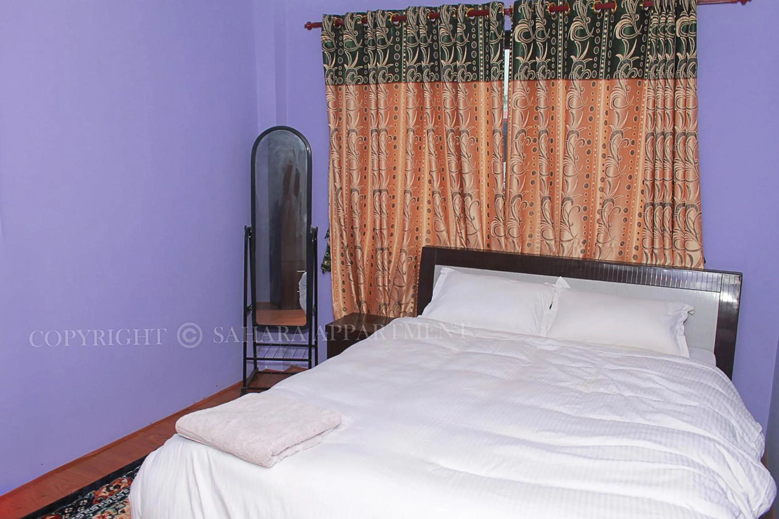 Bed in Sahara Apartment