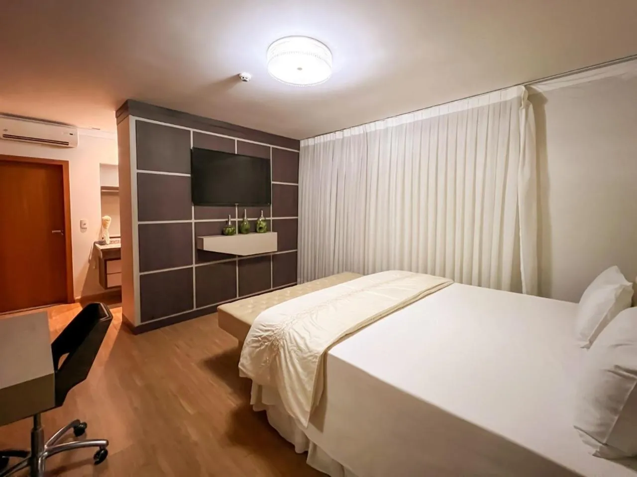 Bed in Paraná Comfort Hotel