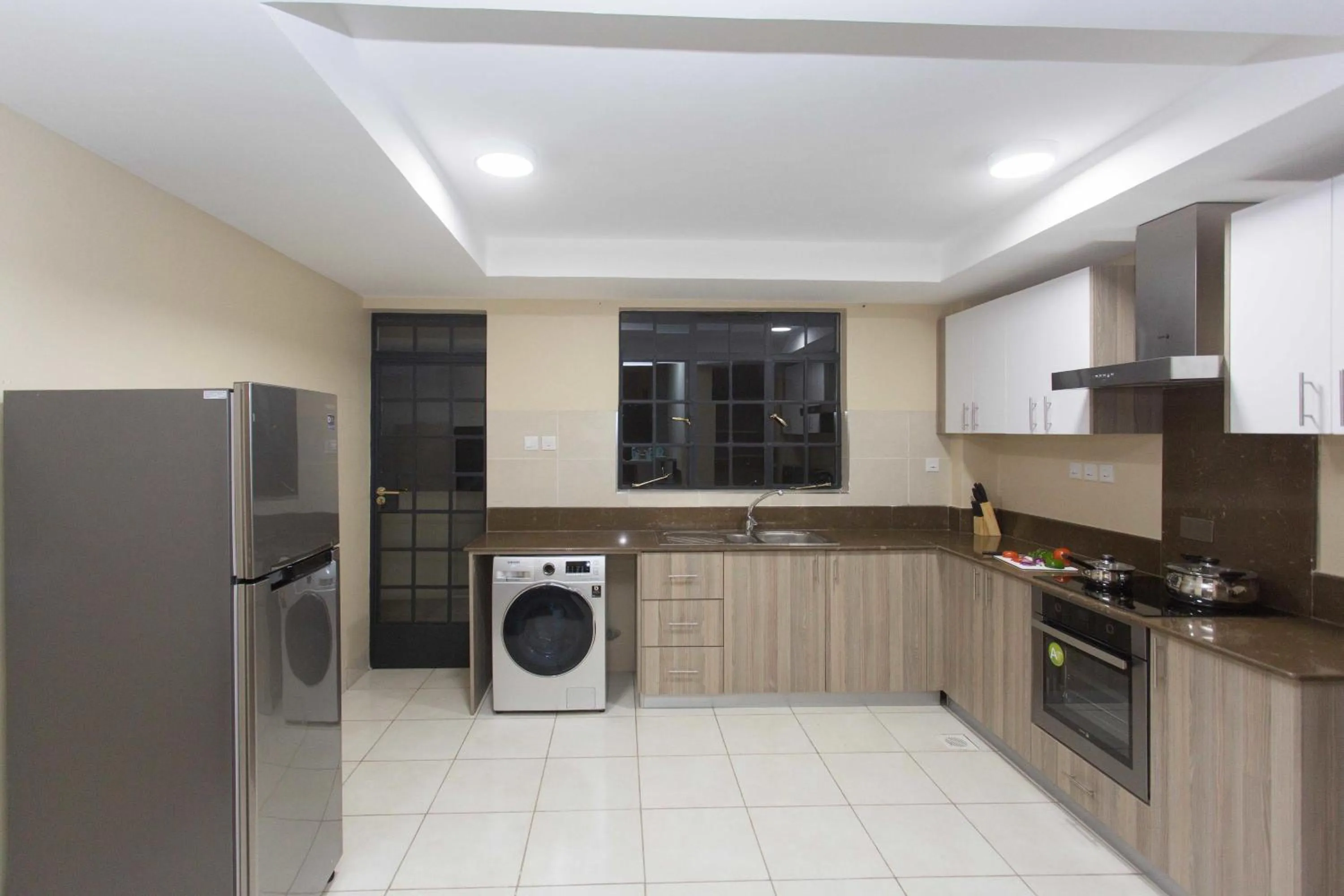 Kitchen or kitchenette in Cozy Residences by Trianum