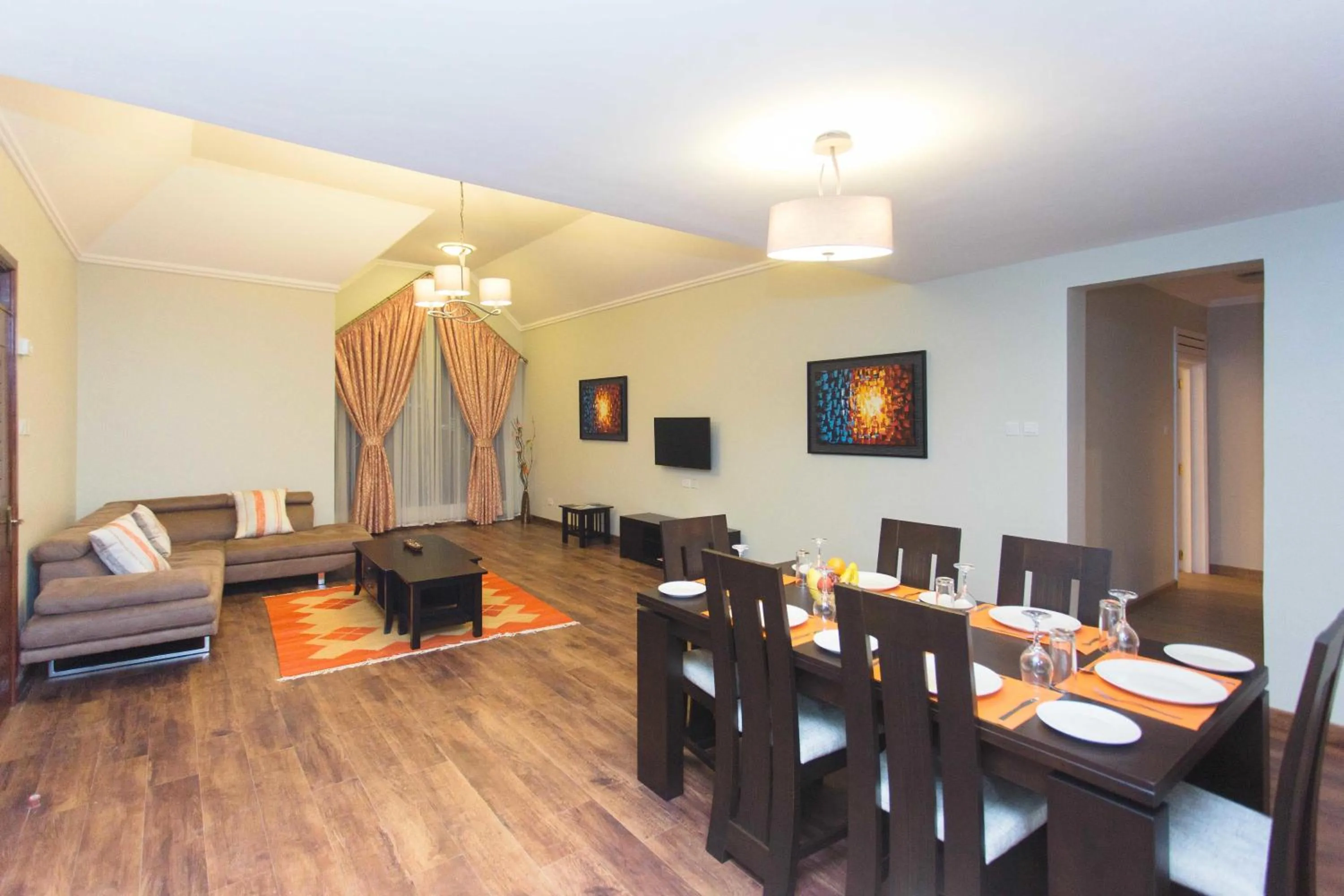 Living room in Cozy Residences by Trianum