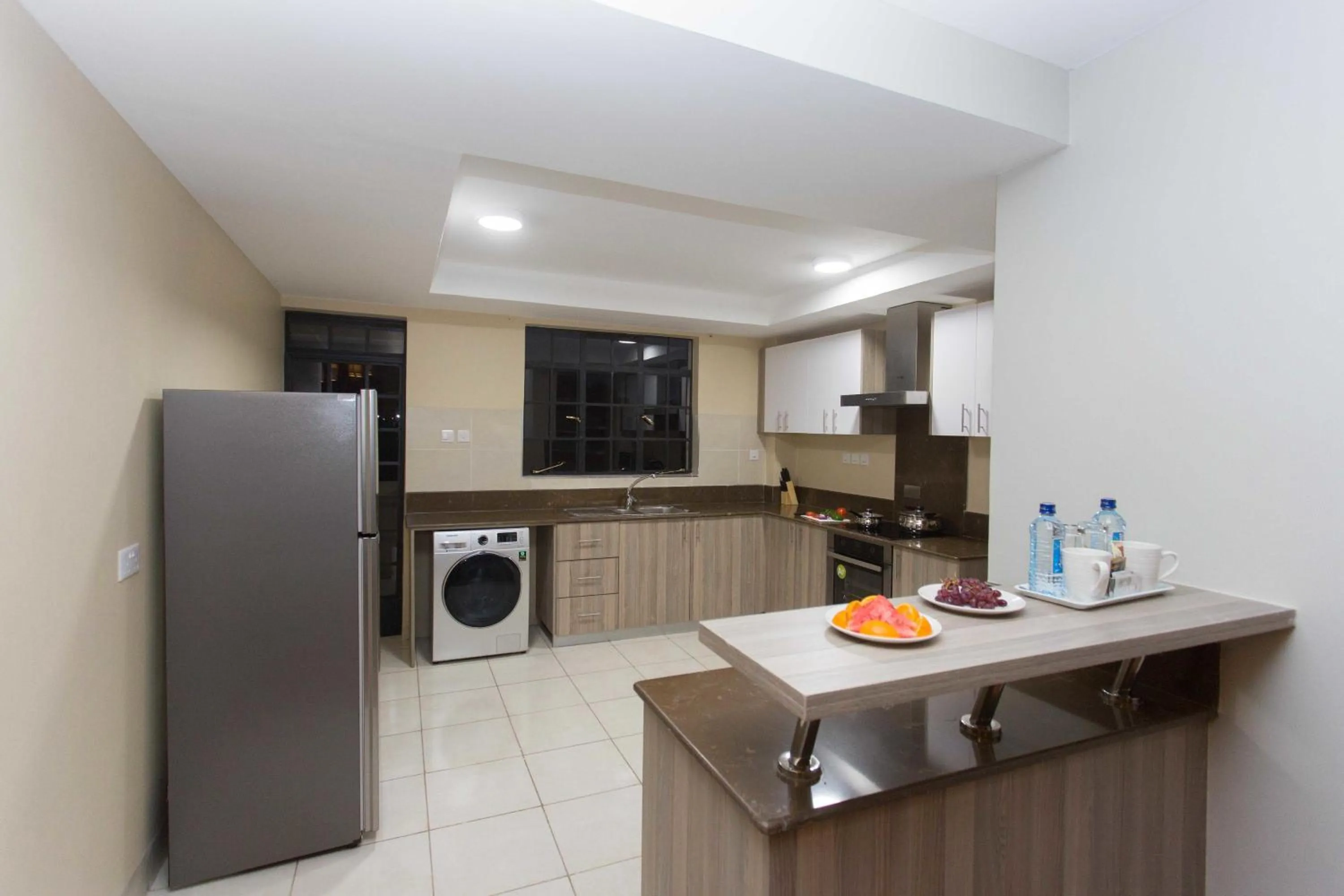 Kitchen or kitchenette in Cozy Residences by Trianum