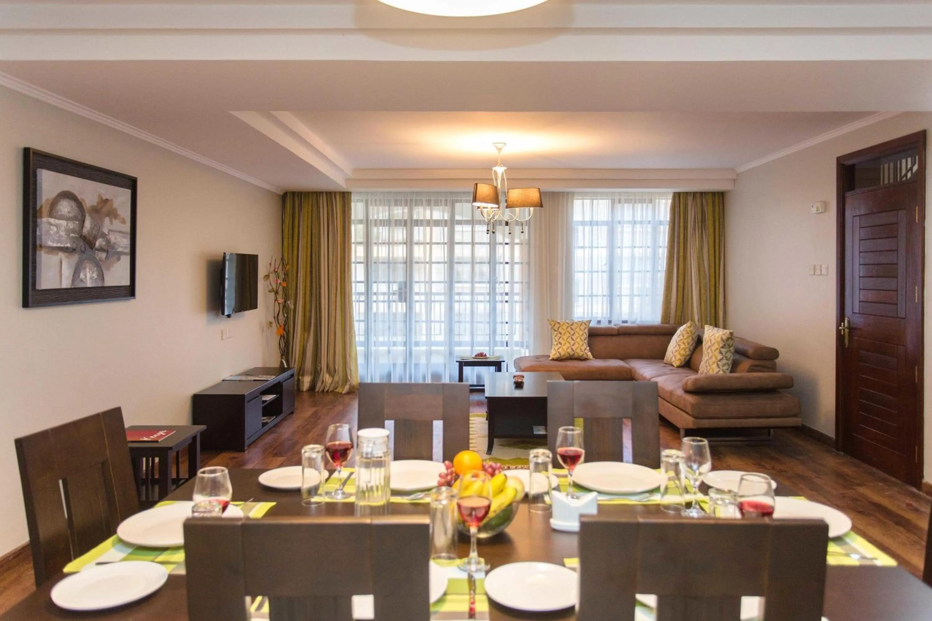 Living room in Cozy Residences by Trianum