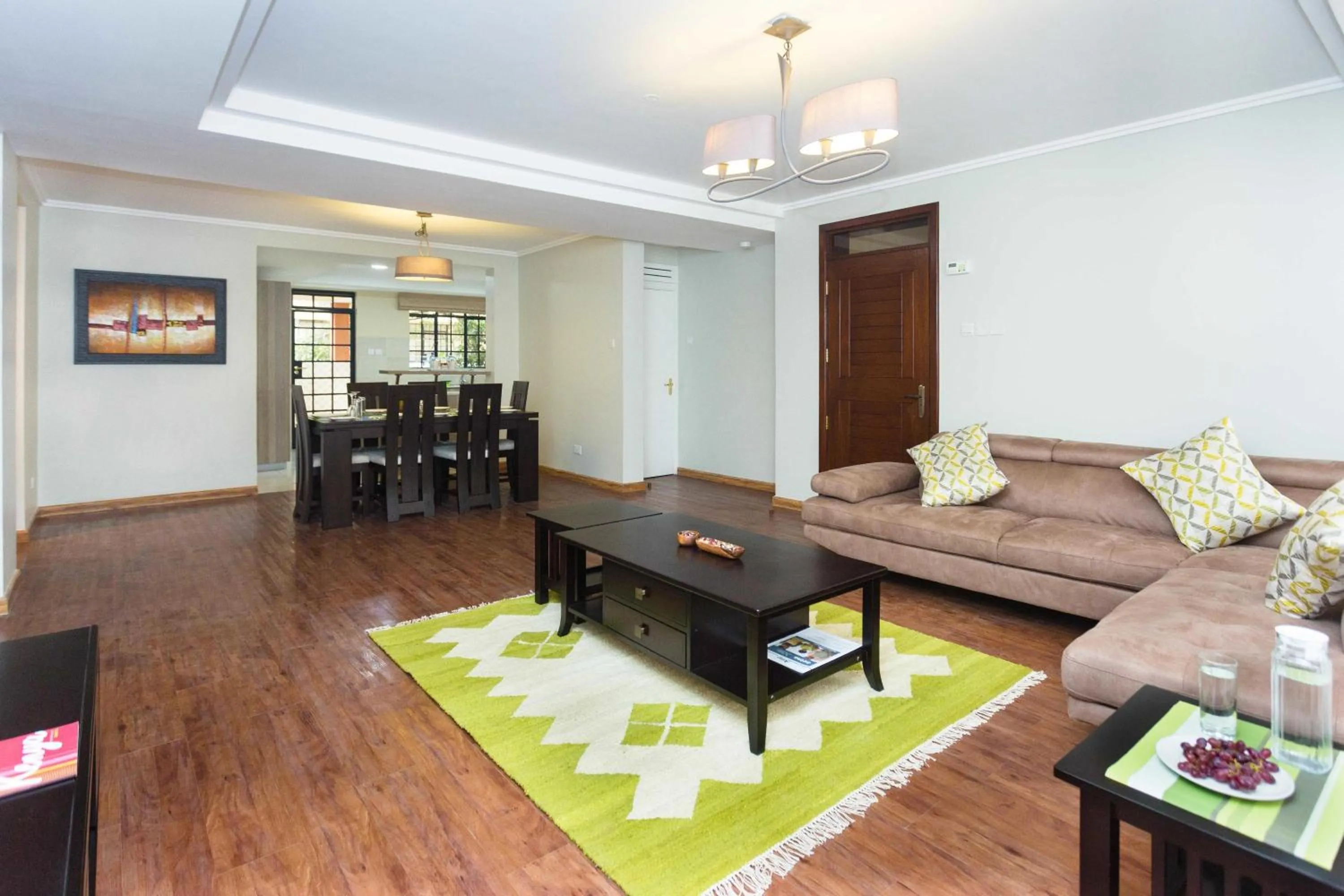 Living room in Cozy Residences by Trianum