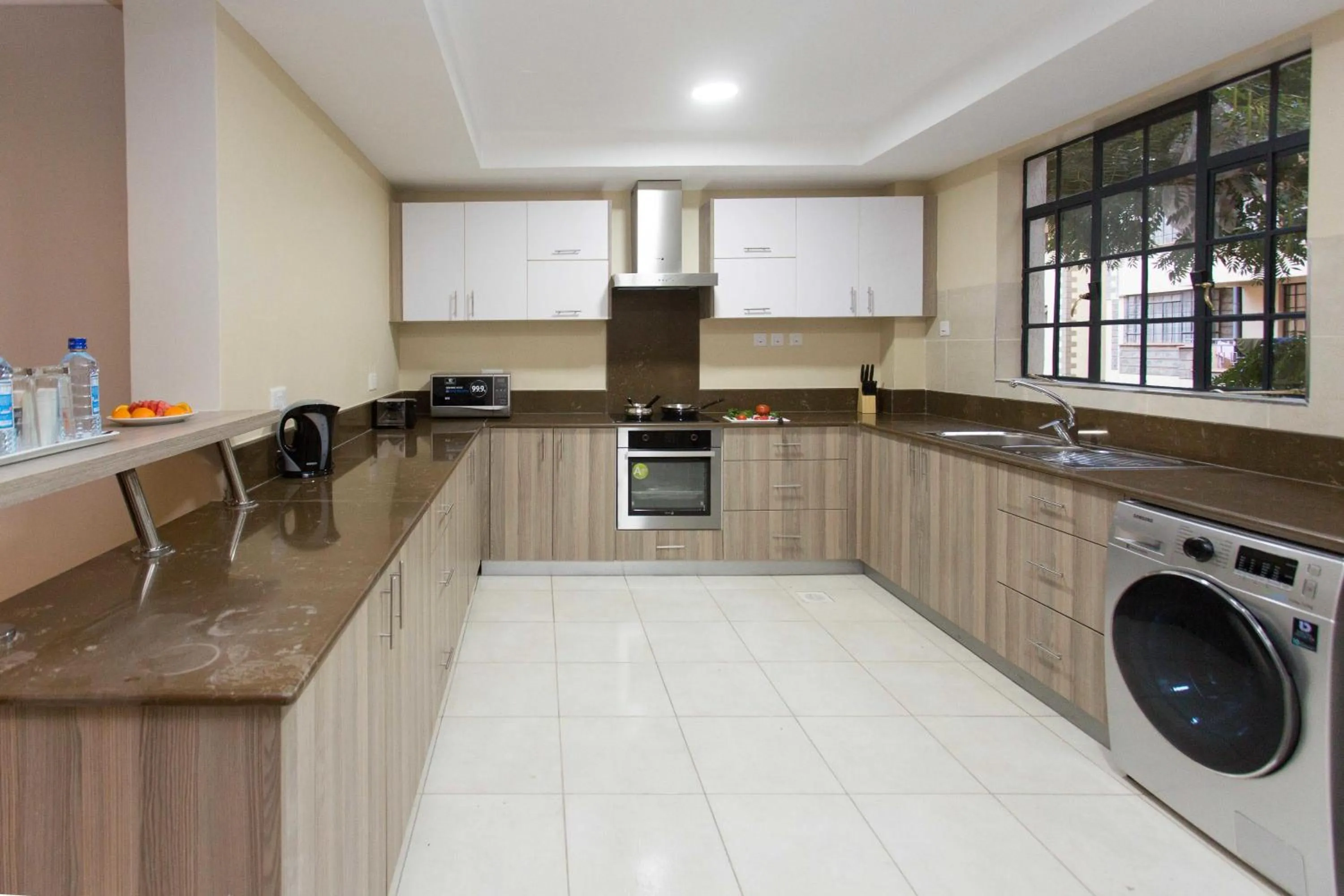 Kitchen or kitchenette in Cozy Residences by Trianum