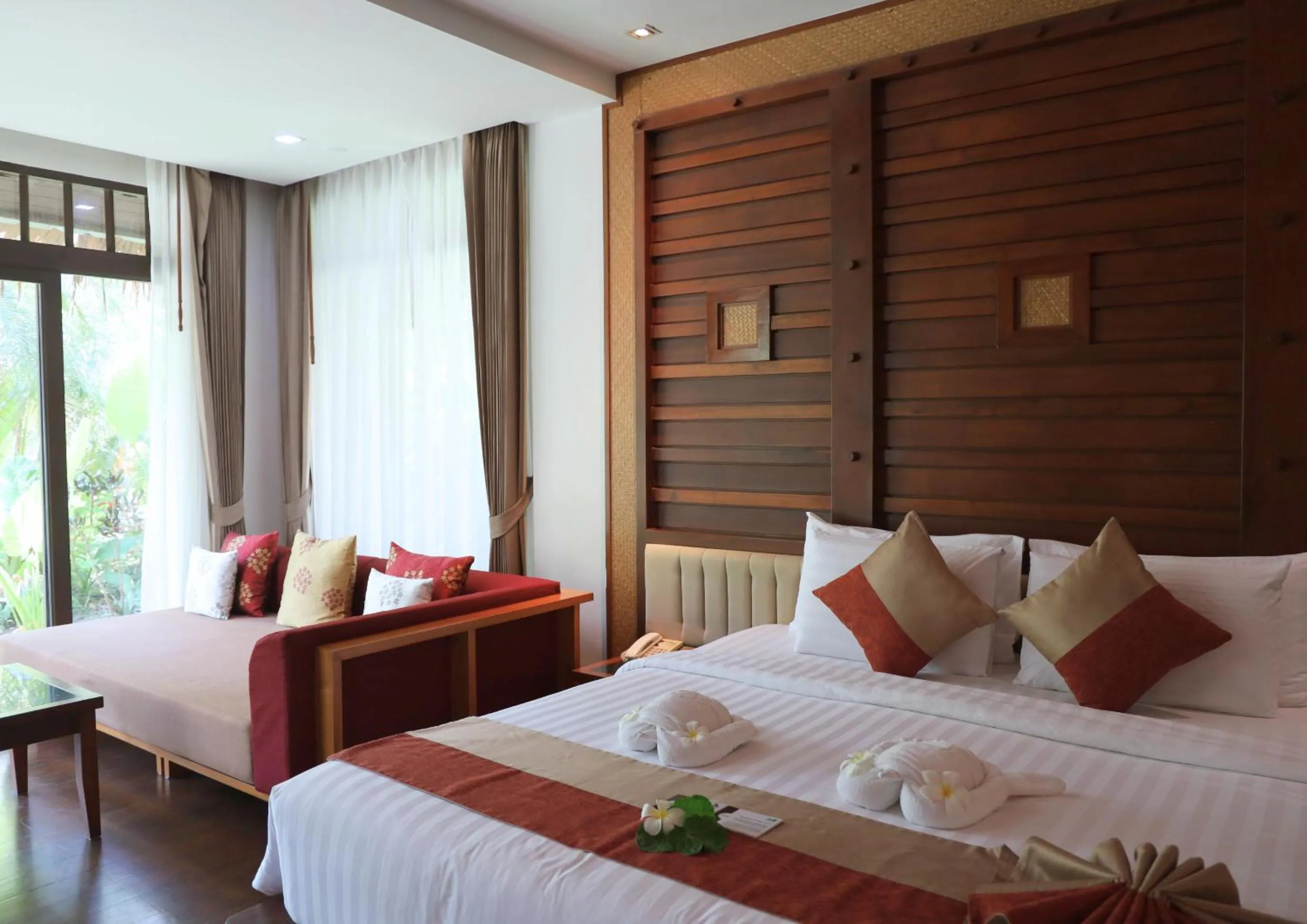 Bed in Railay Village Resort and Spa