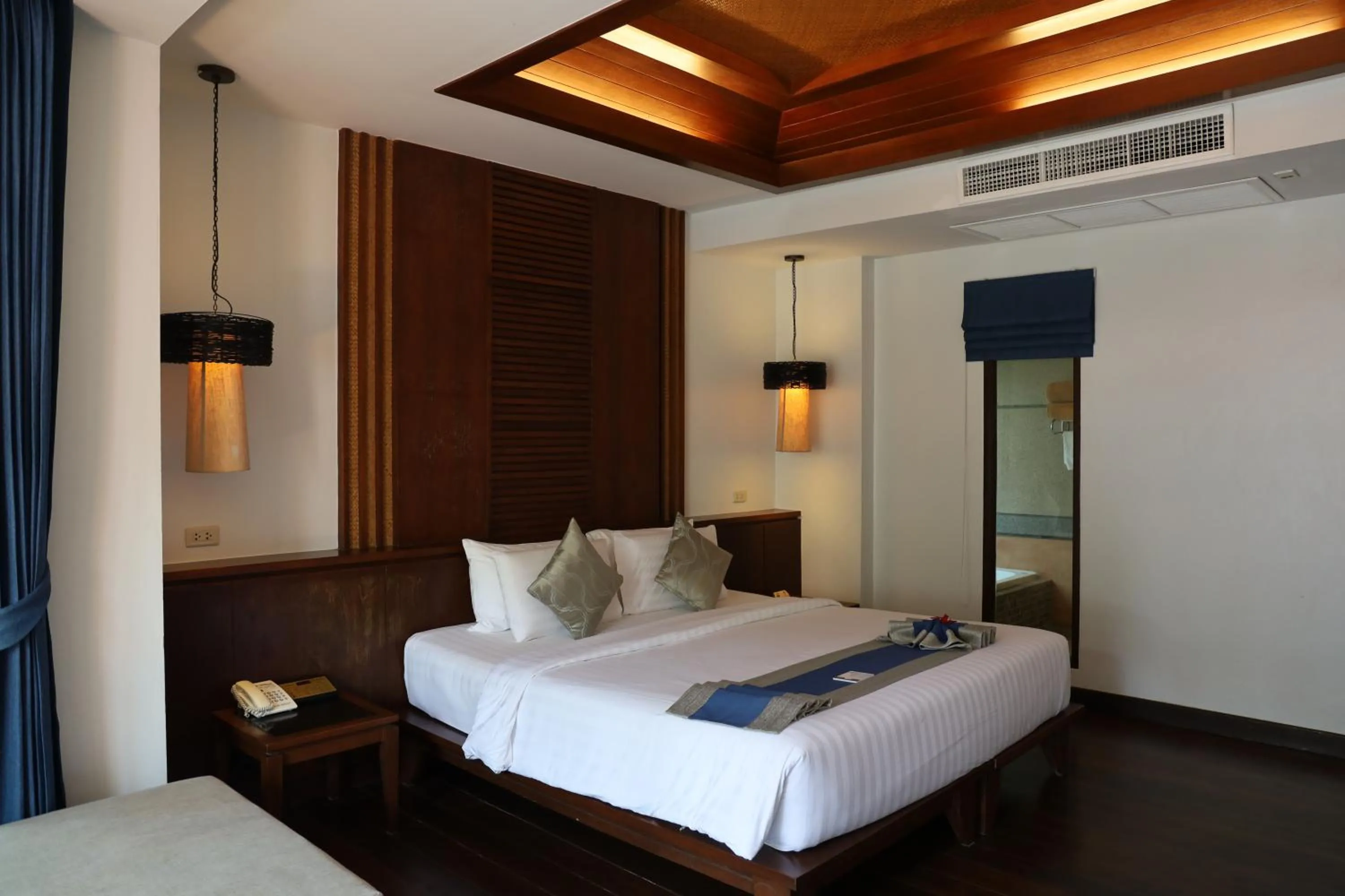 Bed in Railay Village Resort and Spa