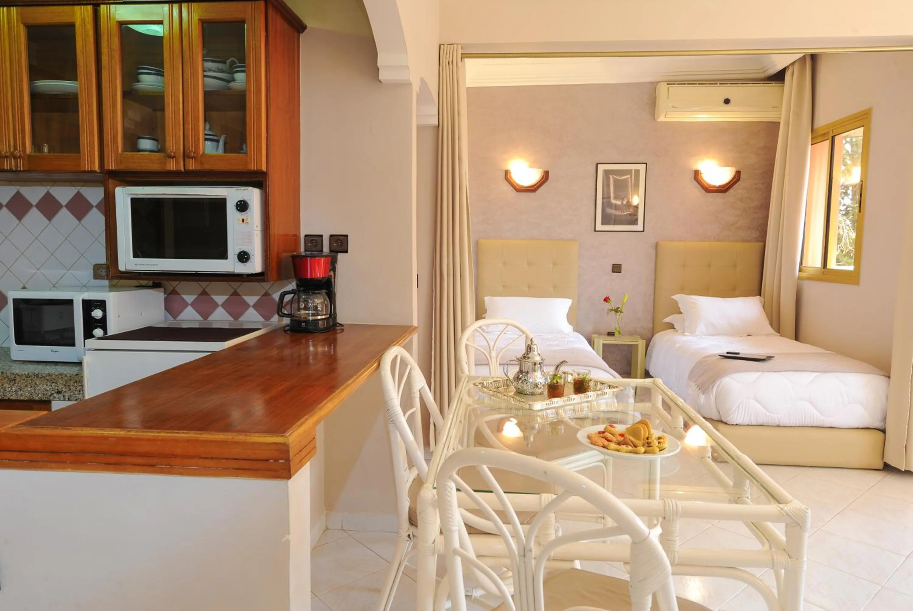 Kitchen or kitchenette in Appart-Hotel Amina Resort & Spa