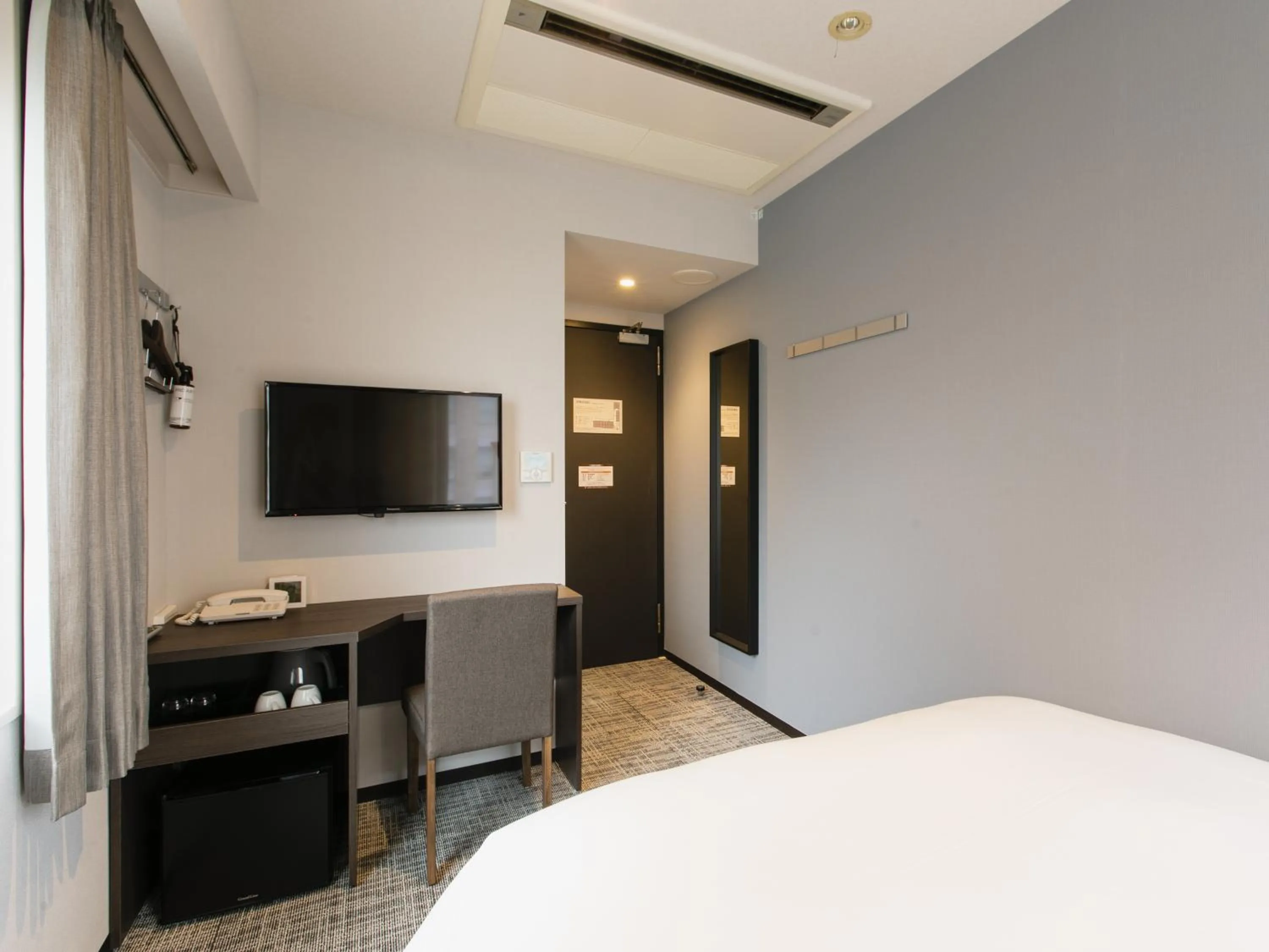 Bed in KOKO HOTEL Ikebukuro East - formerly Hotel Wing International Ikebukuro