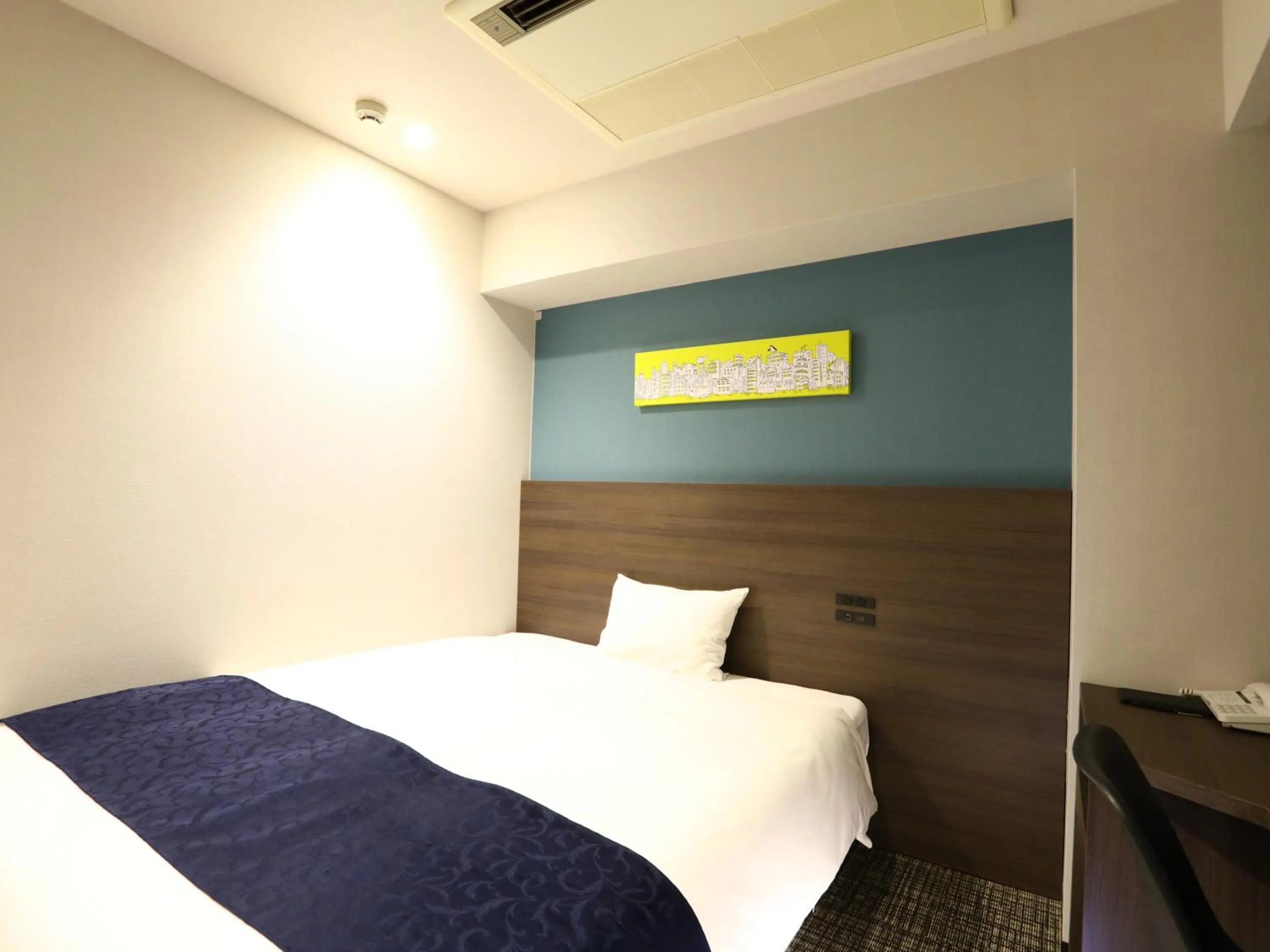 Bed in KOKO HOTEL Ikebukuro East - formerly Hotel Wing International Ikebukuro