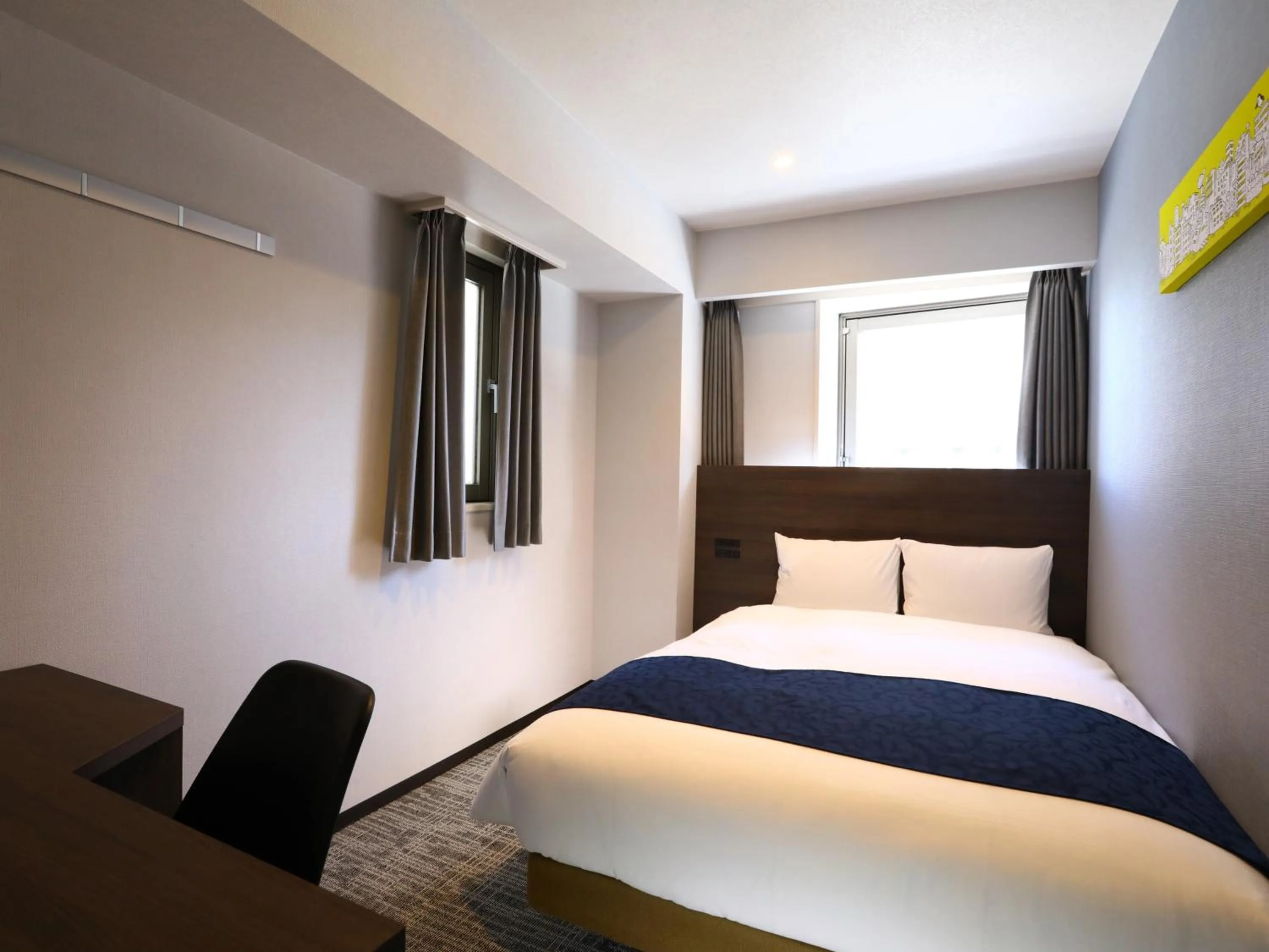 Bed in KOKO HOTEL Ikebukuro East - formerly Hotel Wing International Ikebukuro