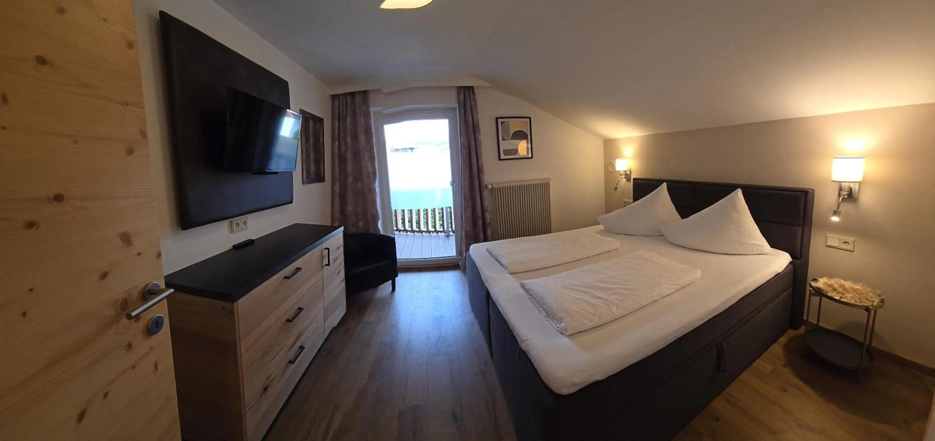 Bed in Adler Hotel-Pension