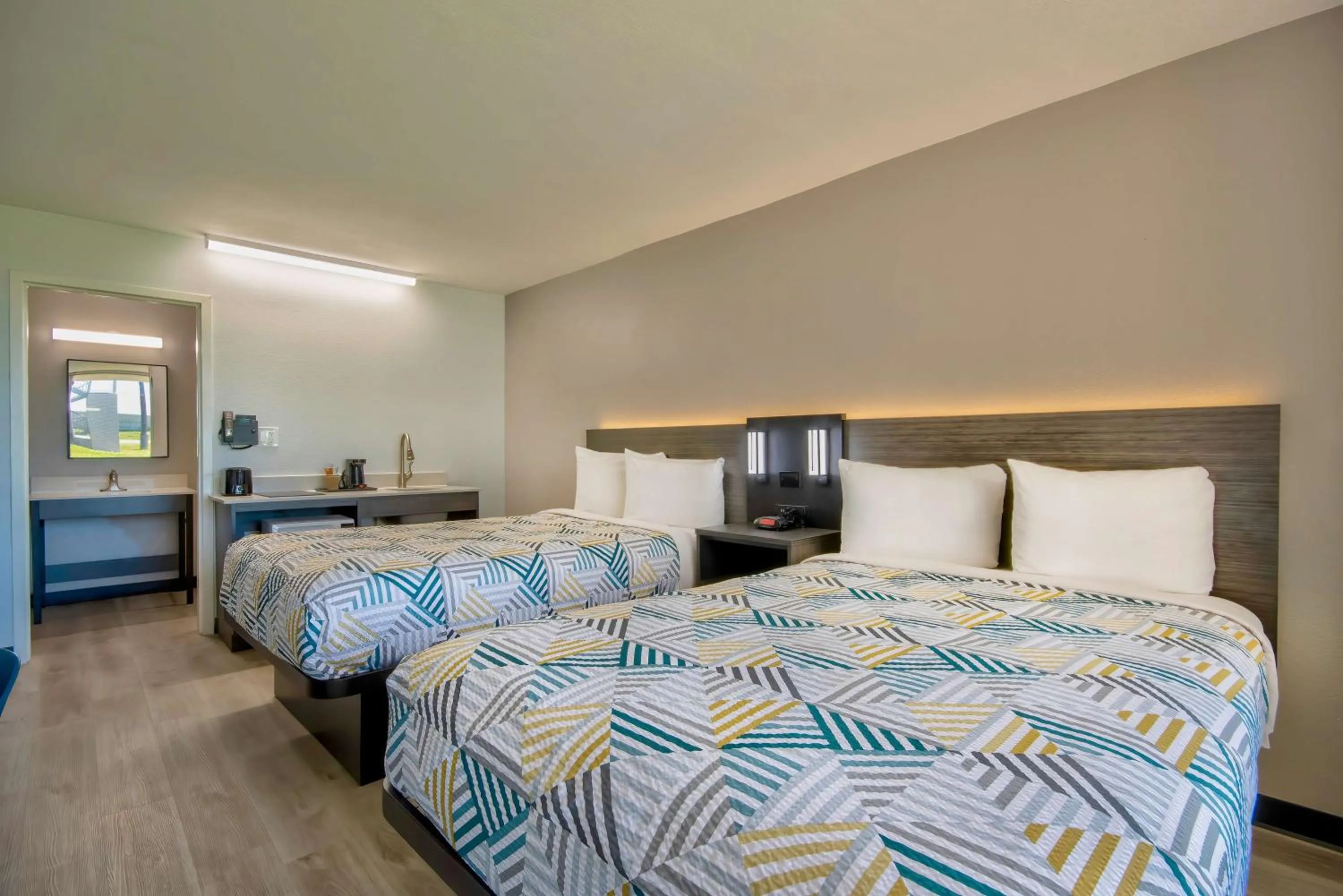 Photo of the whole room, Bed in Studio 6 Rosenberg TX