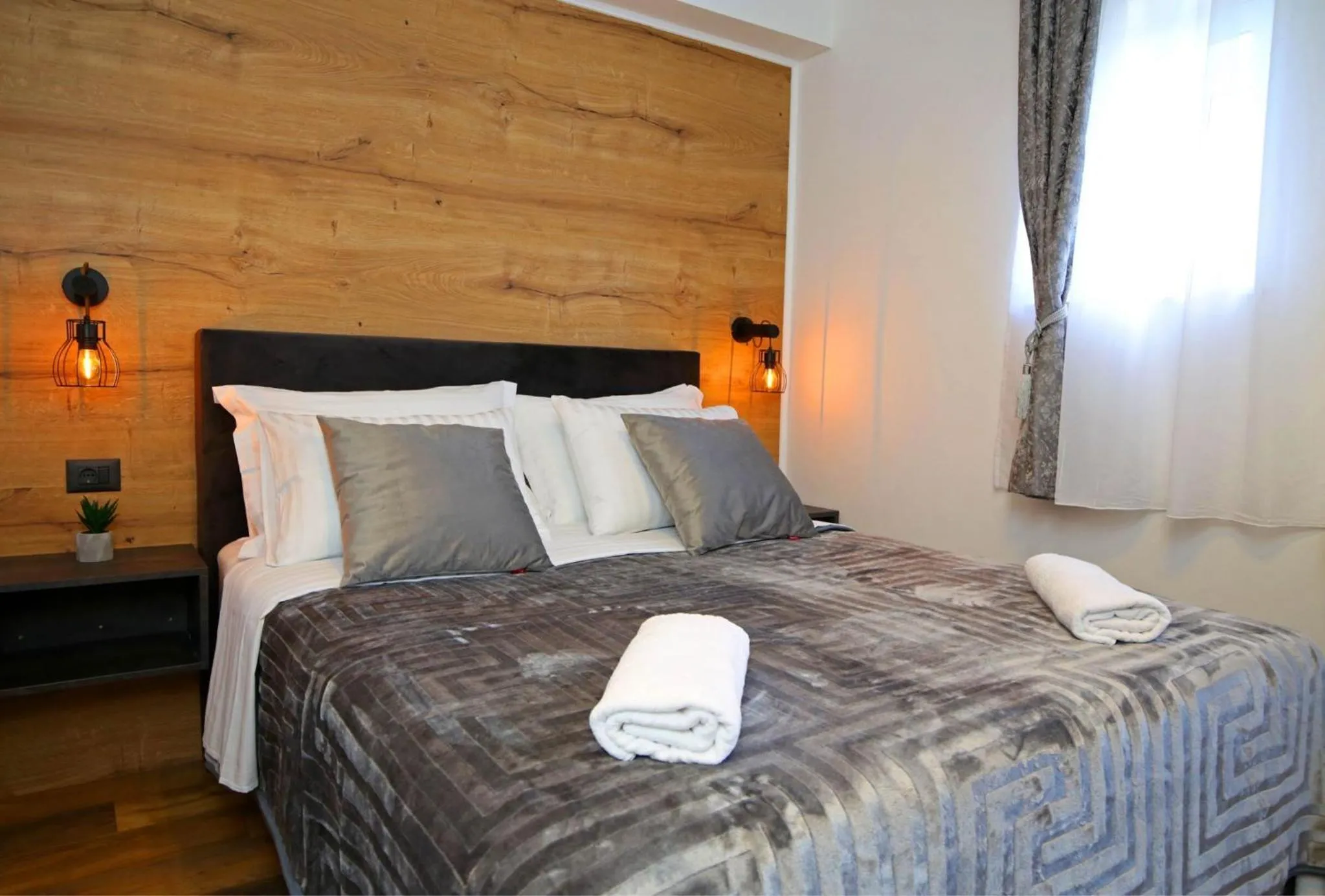 Bed in Apartmani Krka Rooms