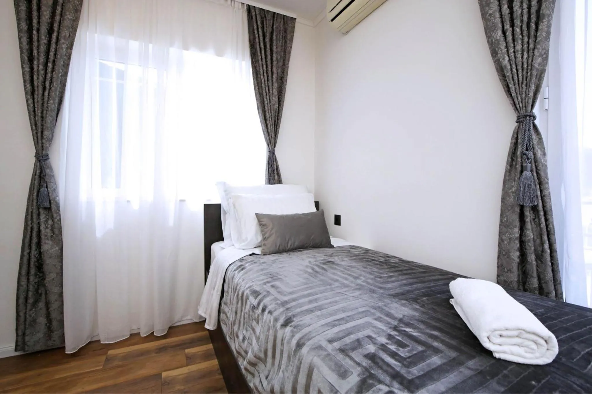 Bed in Apartmani Krka Rooms