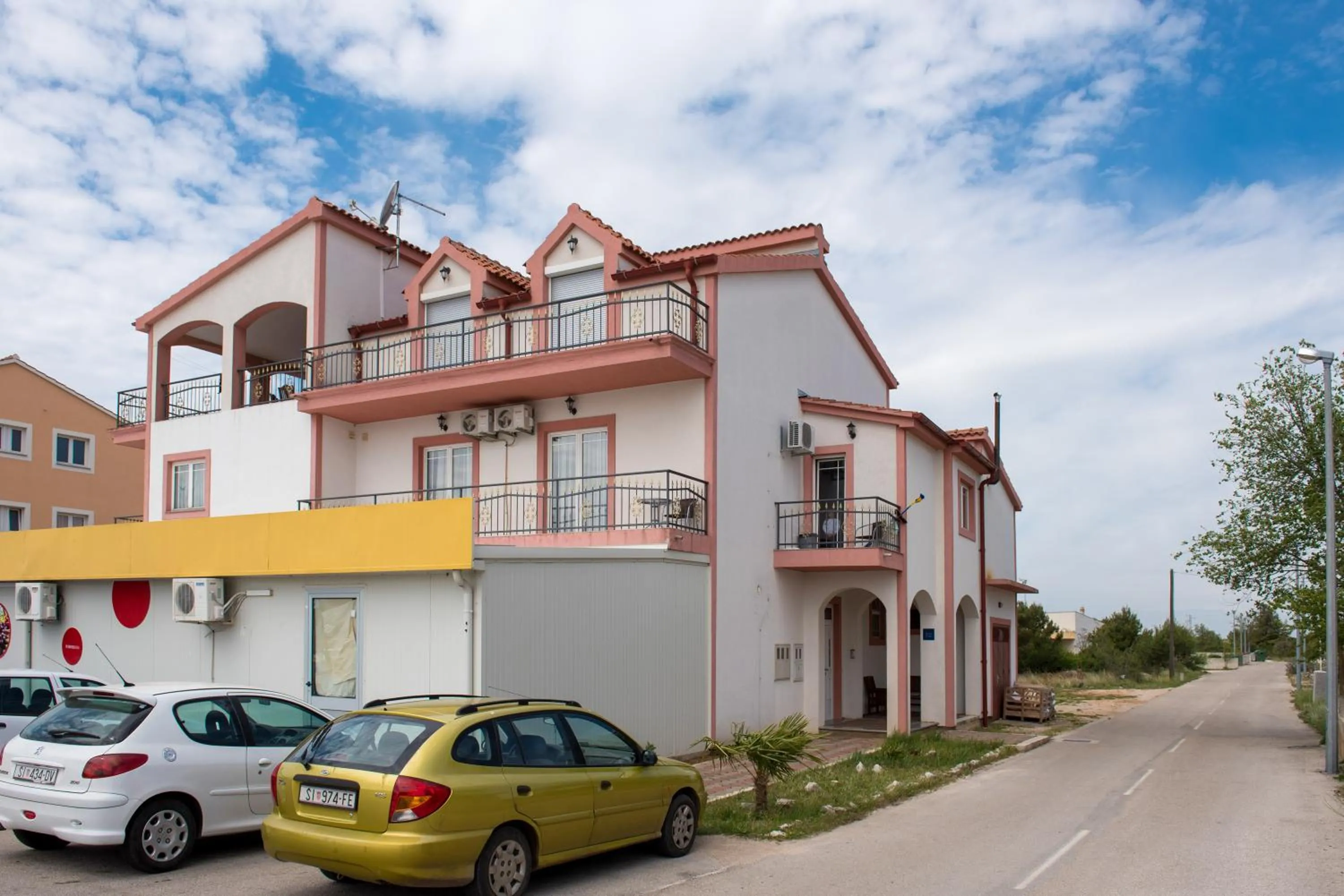 Property building in Apartmani Krka Rooms