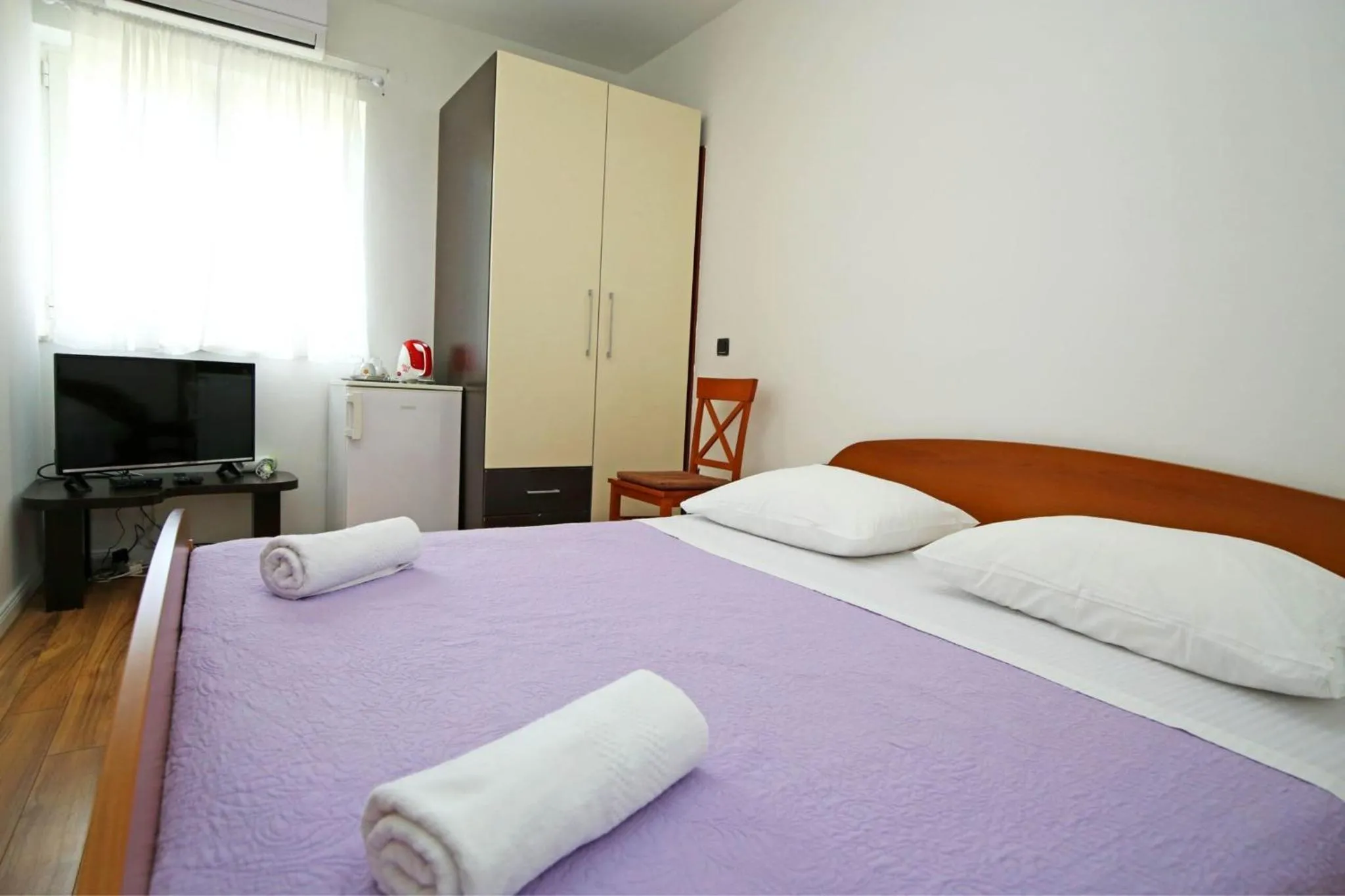 Bed in Apartmani Krka Rooms