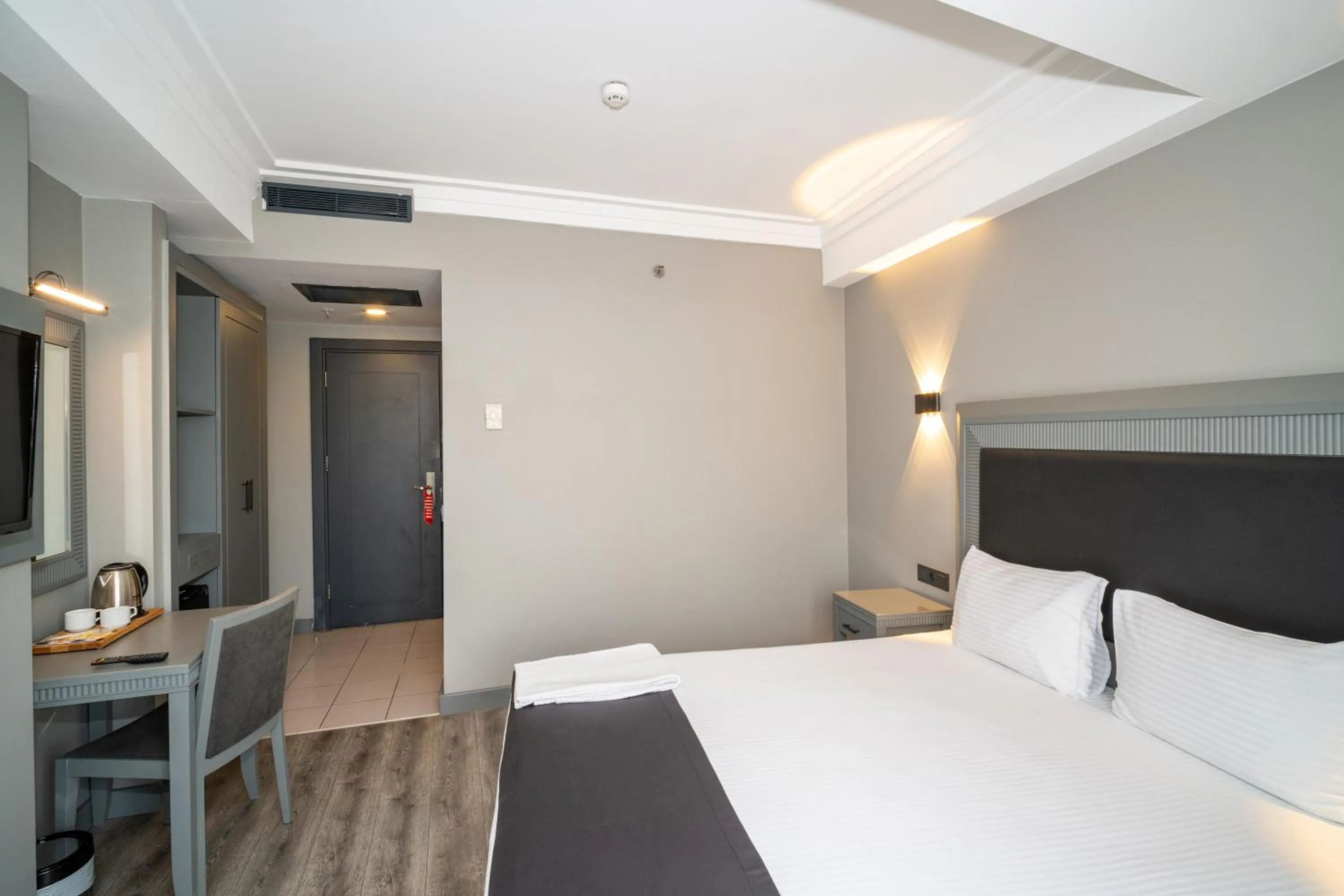 Bed in Grand S Hotel