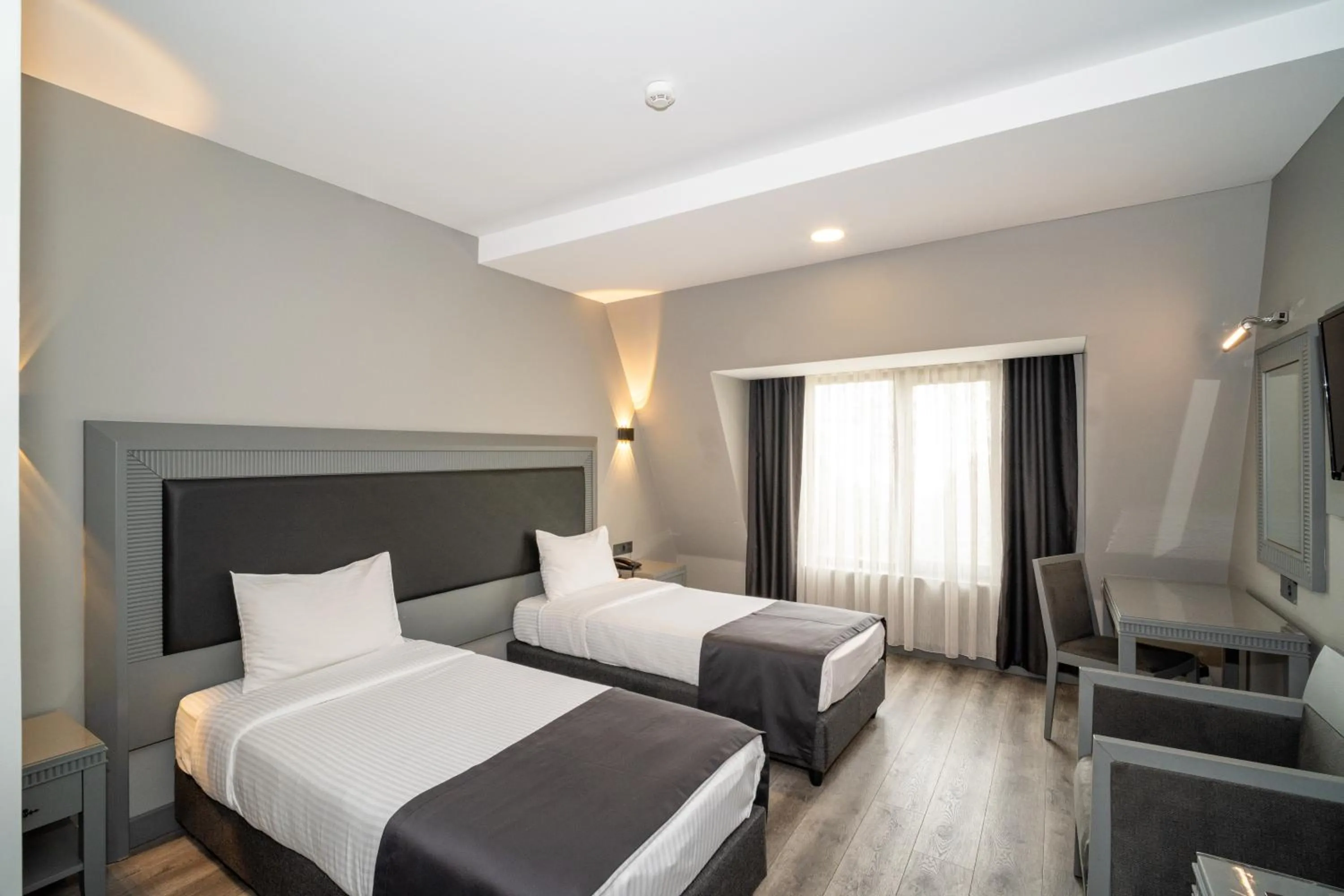 Bed in Grand S Hotel