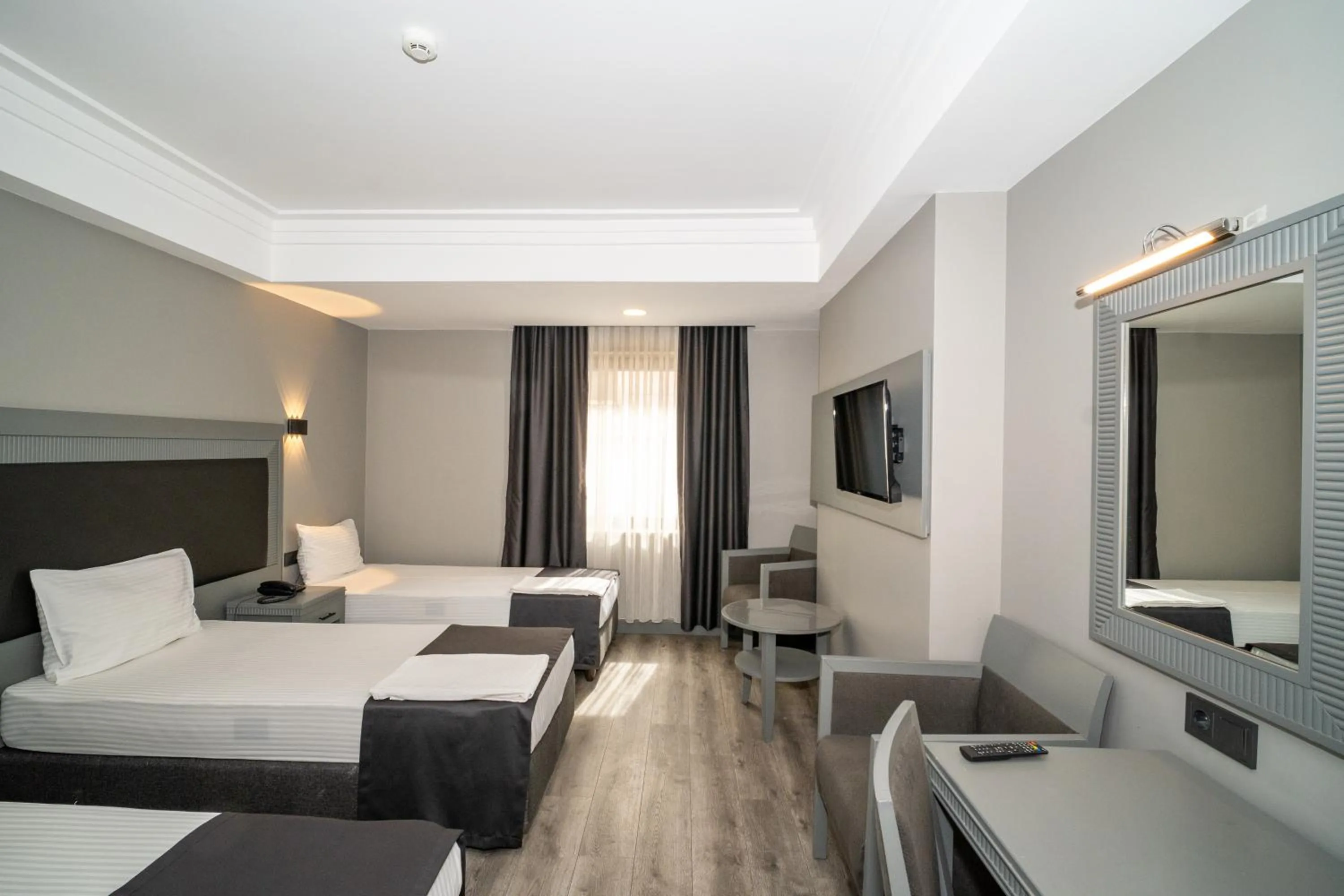 Bed in Grand S Hotel