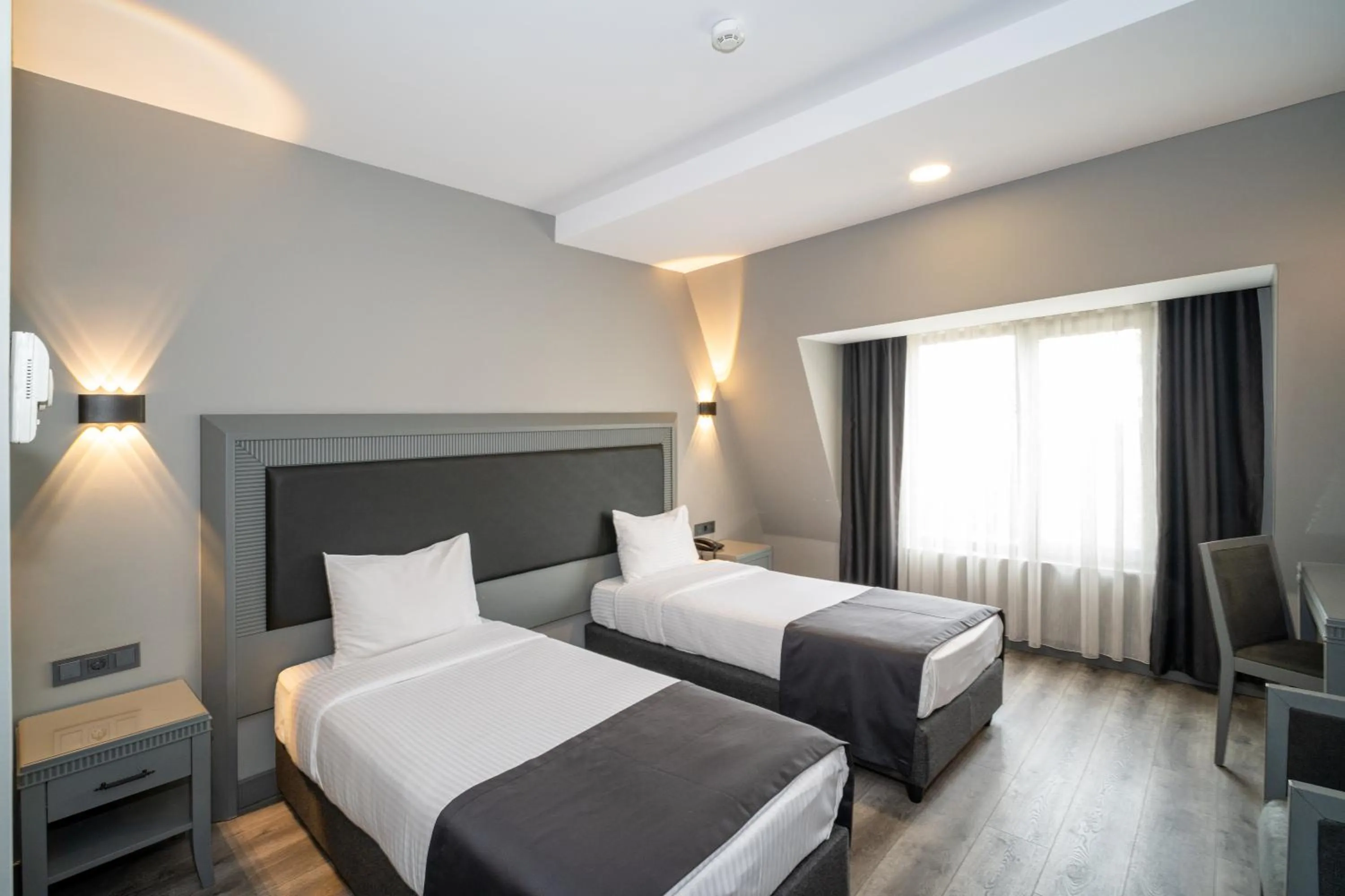 Bed in Grand S Hotel