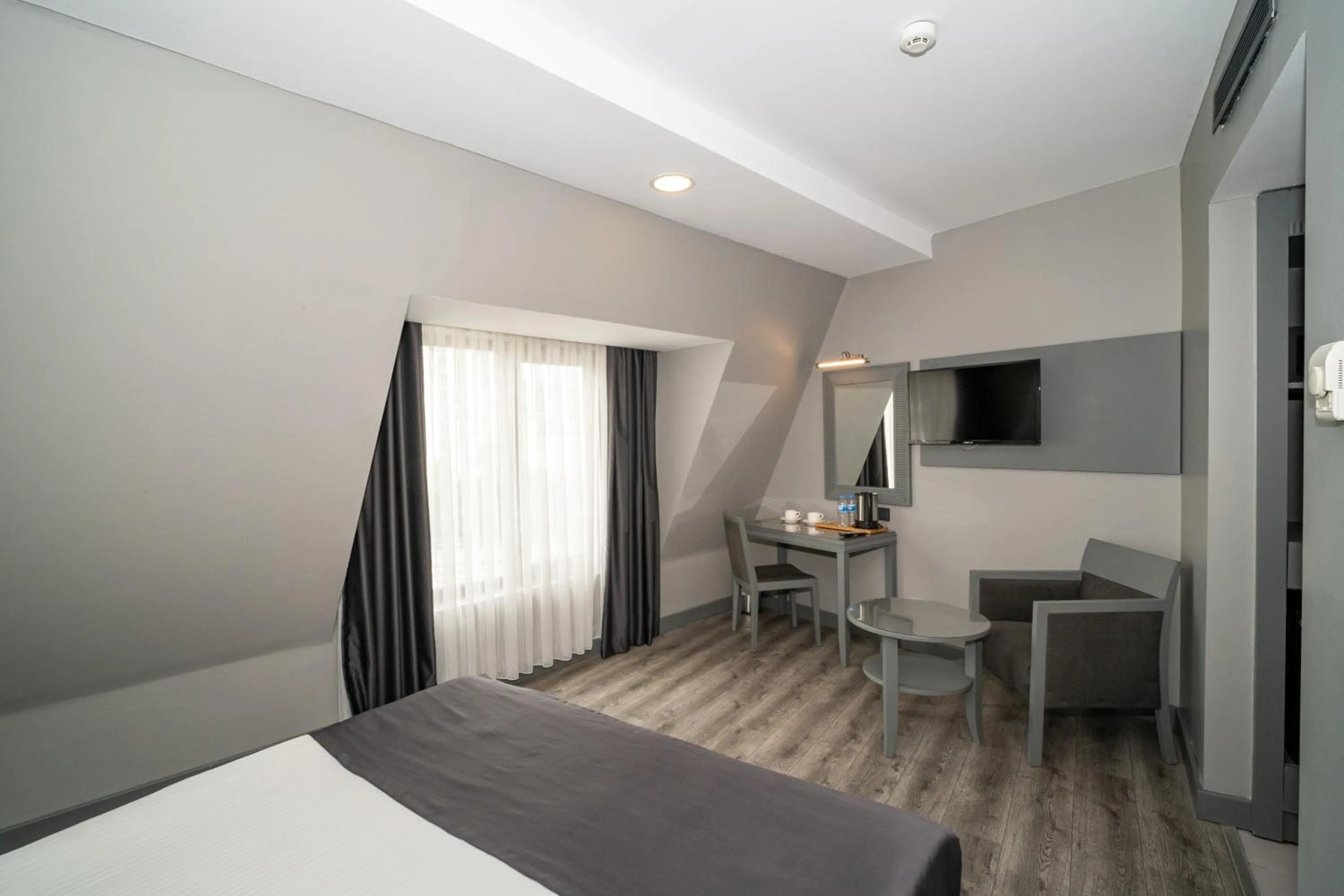 Bed in Grand S Hotel