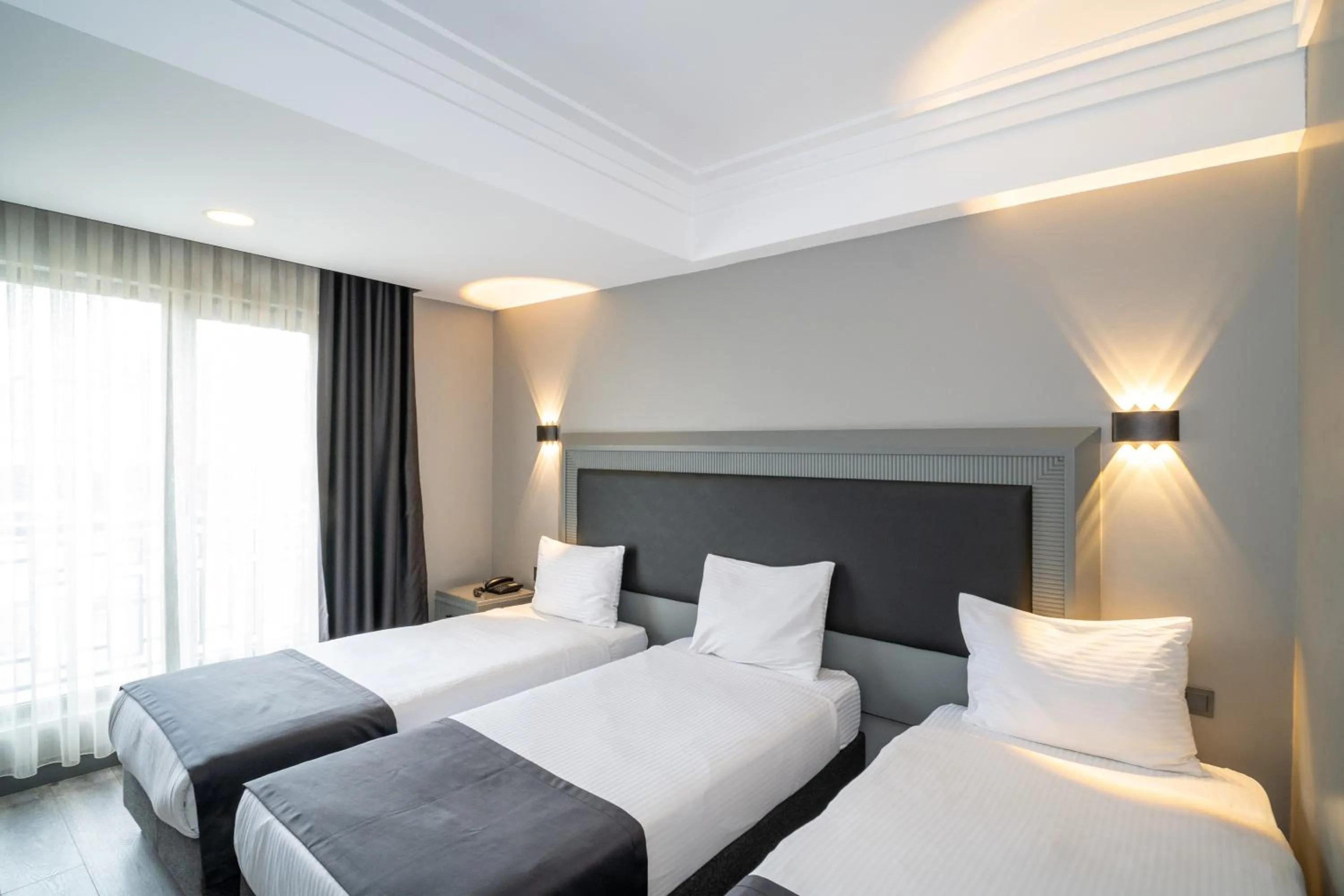 Bed in Grand S Hotel