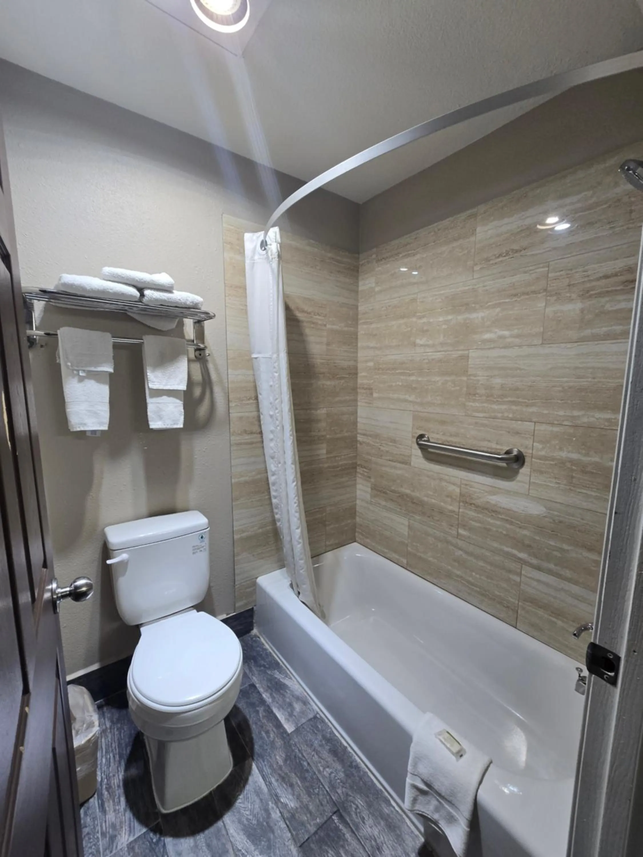 Bathroom in Super 8 by Wyndham Kansas City