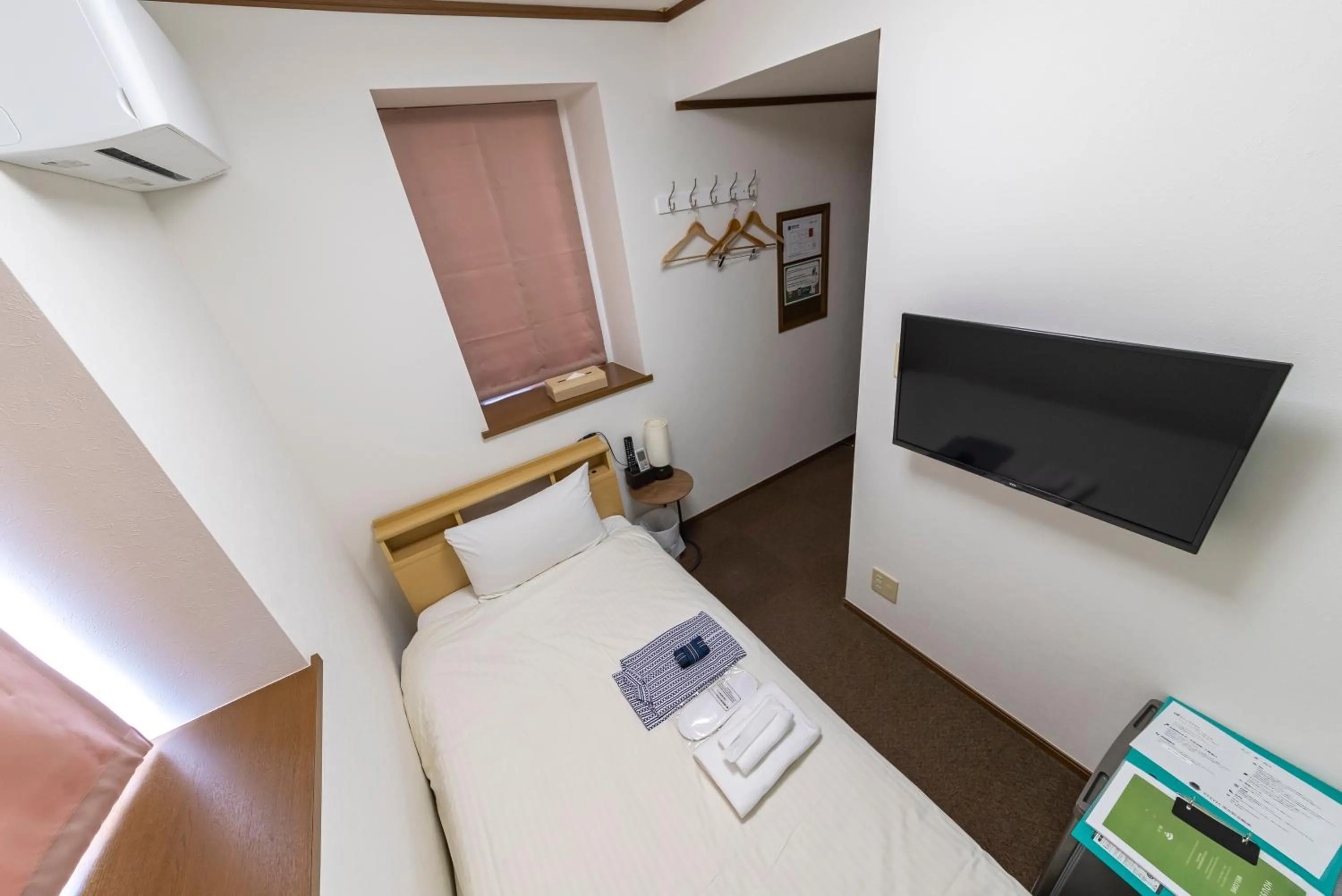 Bed in ETAVIA Yufuin Kinrinko