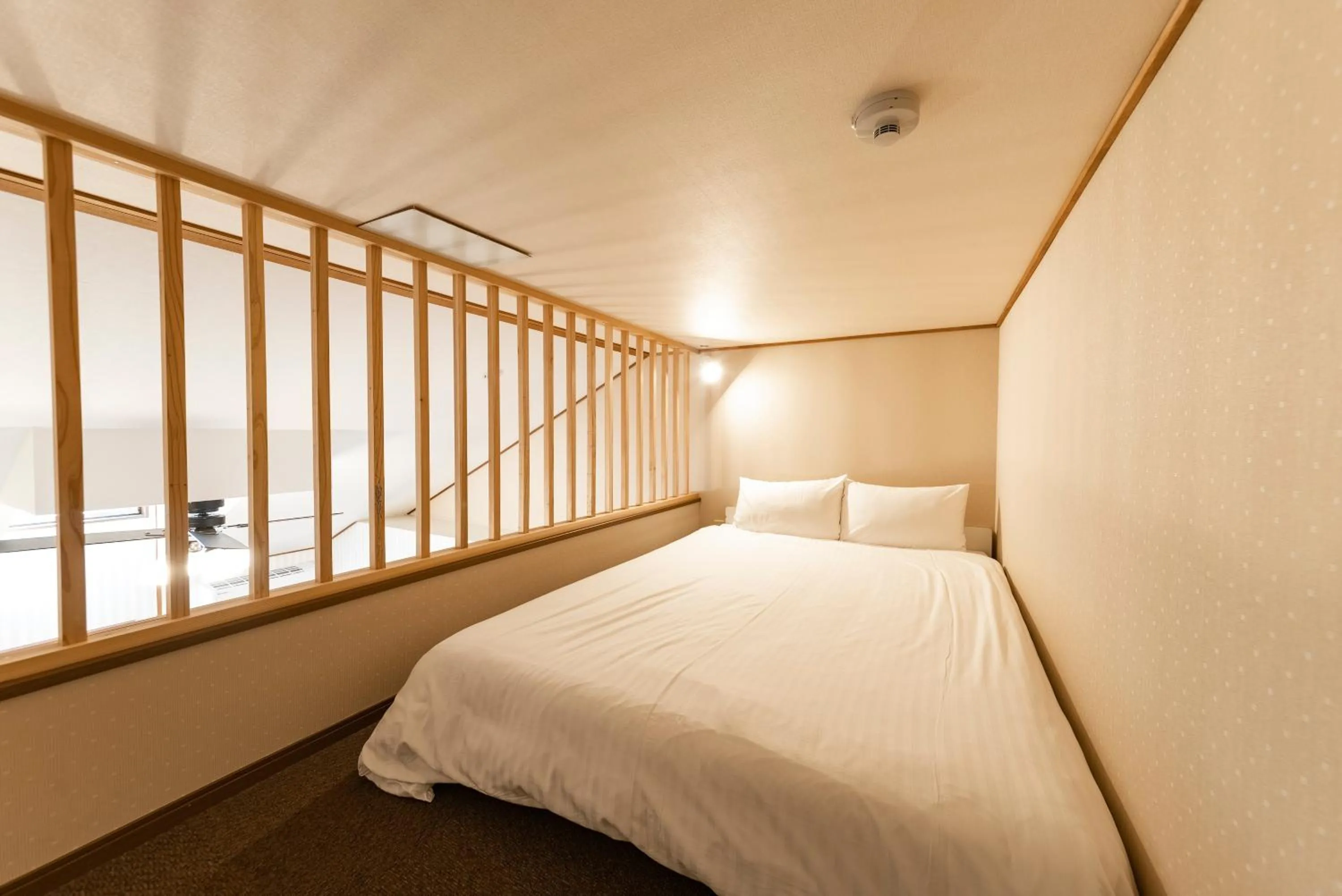 Photo of the whole room, Bed in ETAVIA Yufuin Kinrinko